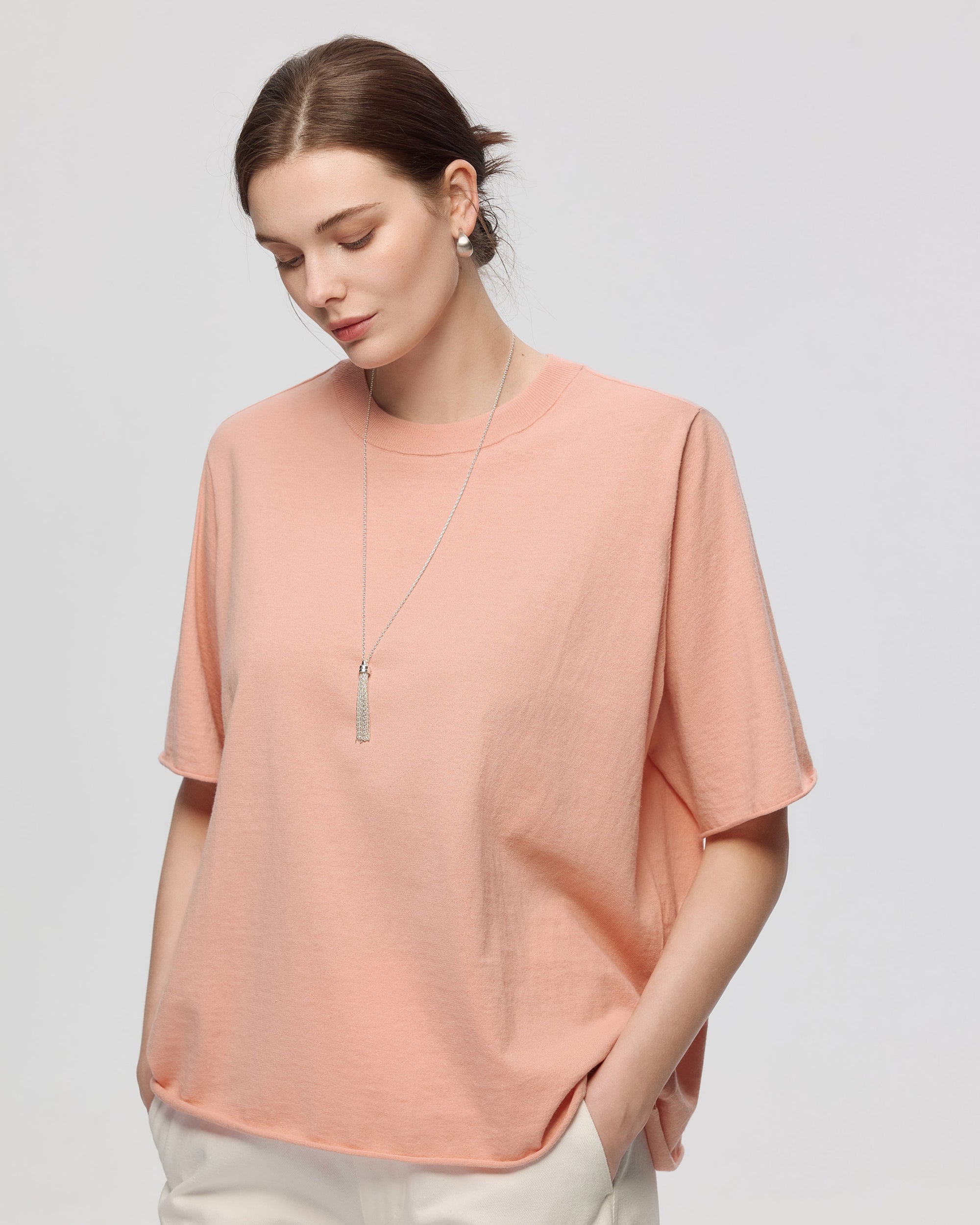 Juana Hemp Essentials Sweater Knit Tee peach (sustainable cotton–hemp) model detail highlighting neckline finish and knit texture