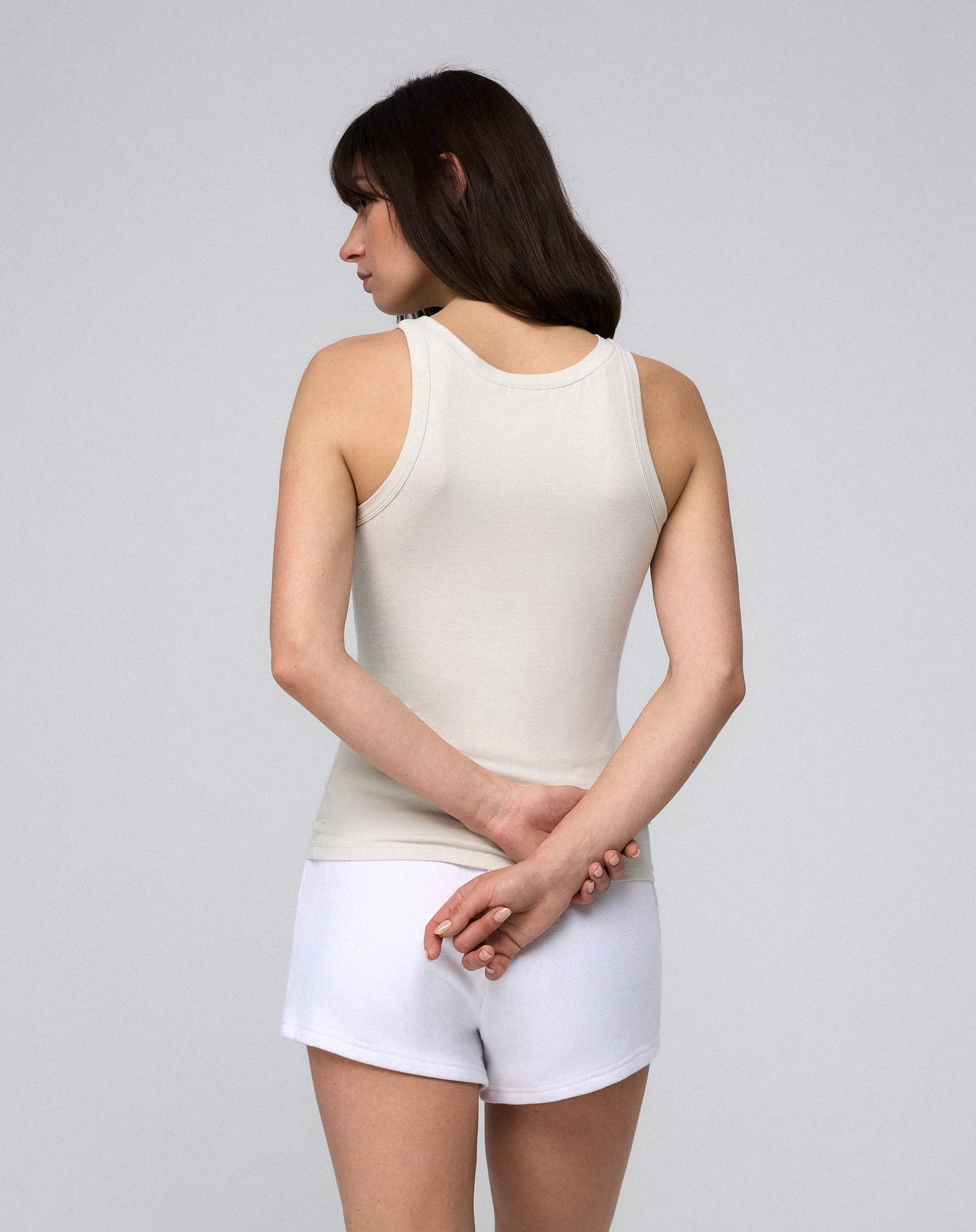 Juana Hemp Essentials Tank cement (organic cotton–hemp blend) back view on model showing clean finish