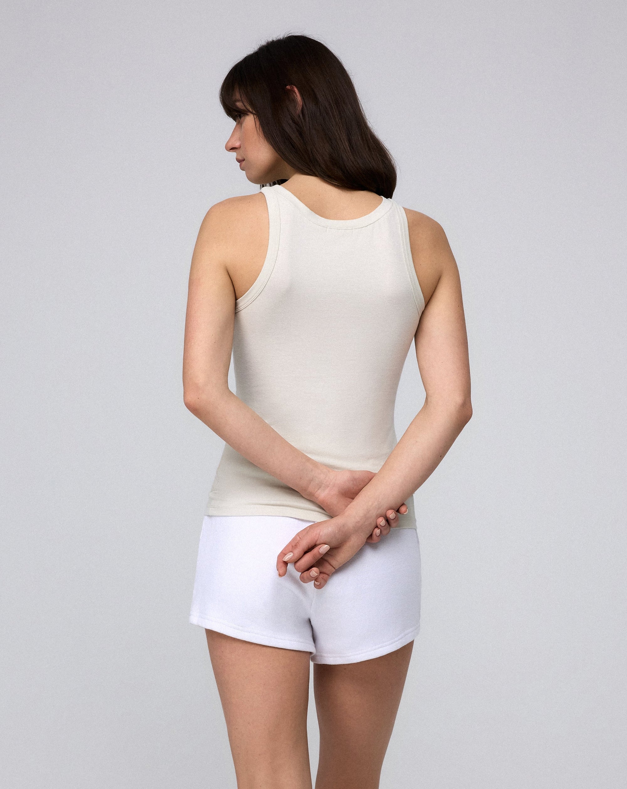 Juana Hemp Essentials Tank cement (organic cotton–hemp blend) back view on model showing clean finish