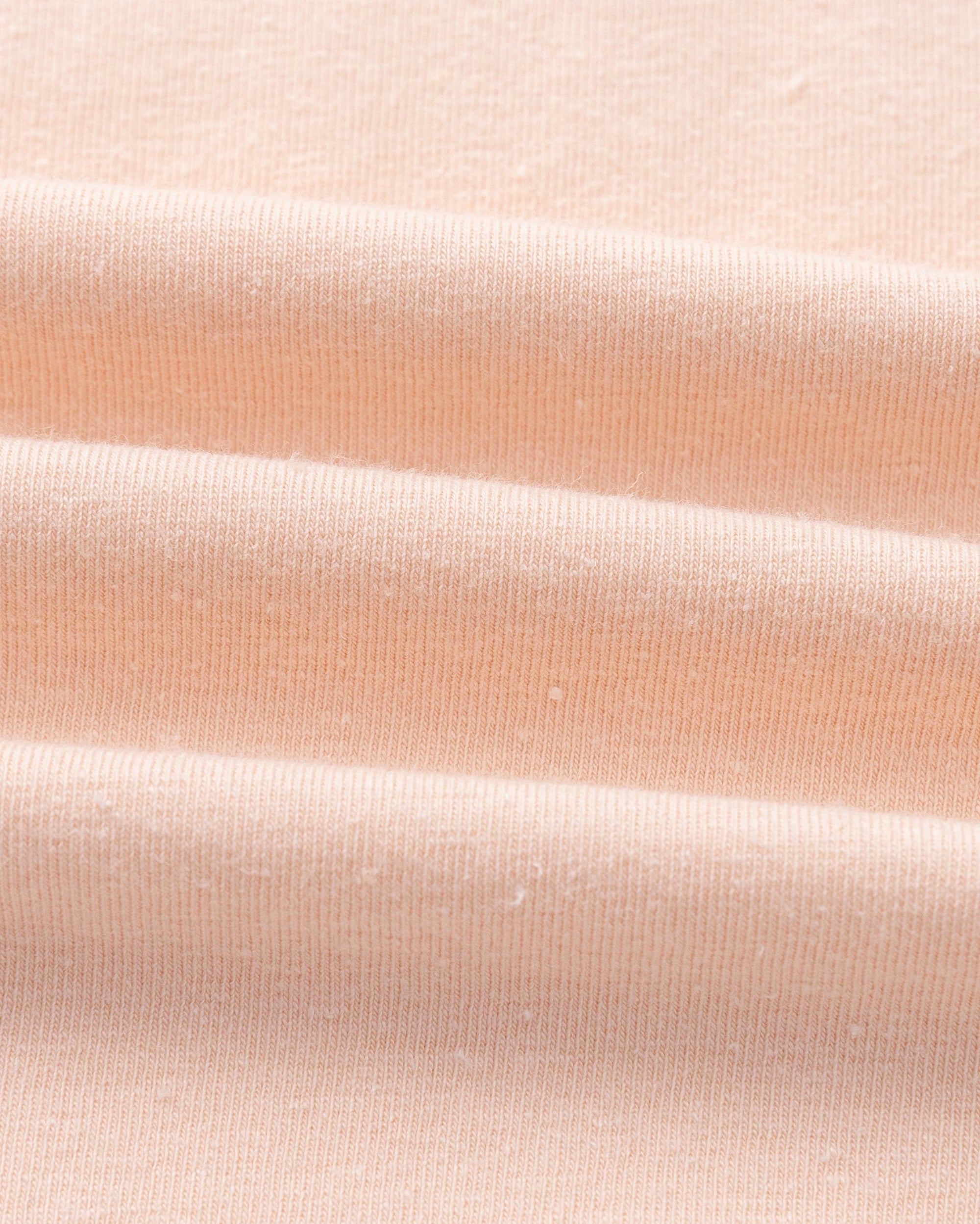 Juana Hemp Essentials Tank peach (organic cotton–hemp blend) textile close-up showing soft jersey surface