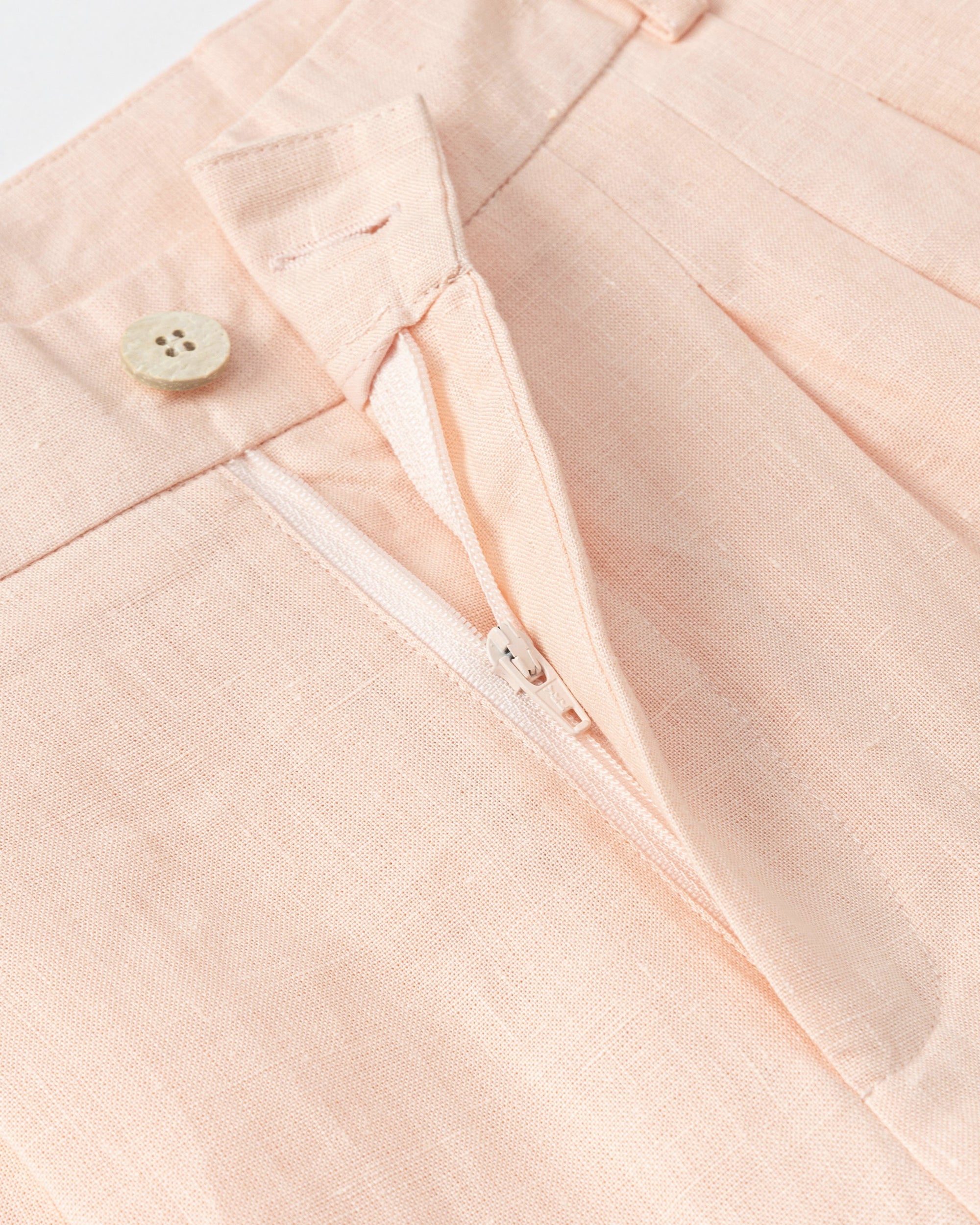 Juana Hemp High Rise Pants Light Peach (hemp) showing corozo button closure and front finish.