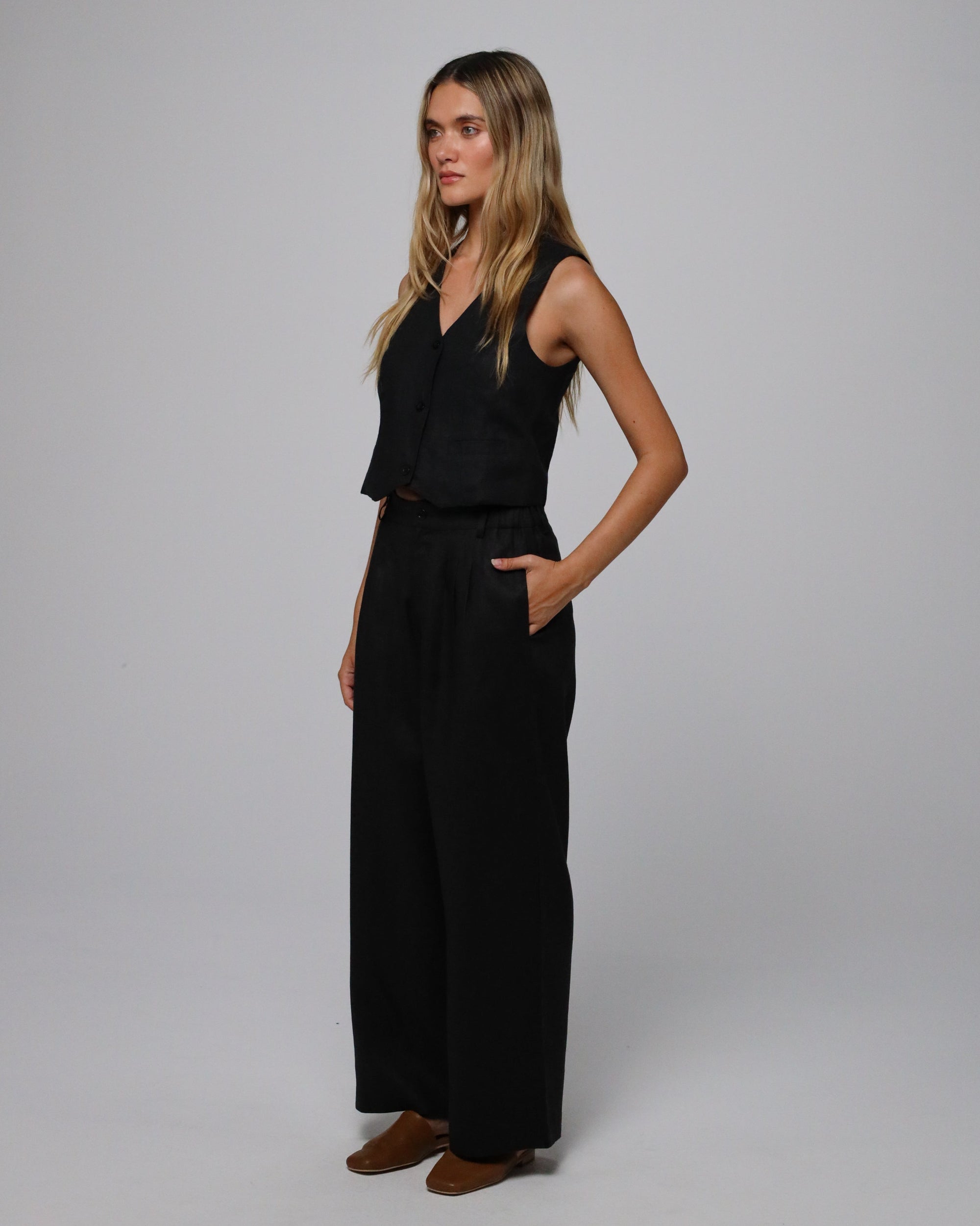 Full-body view of Juana Hemp High Rise Pants (natural) paired with the Juana Hemp Tailored Vest for a matching set.