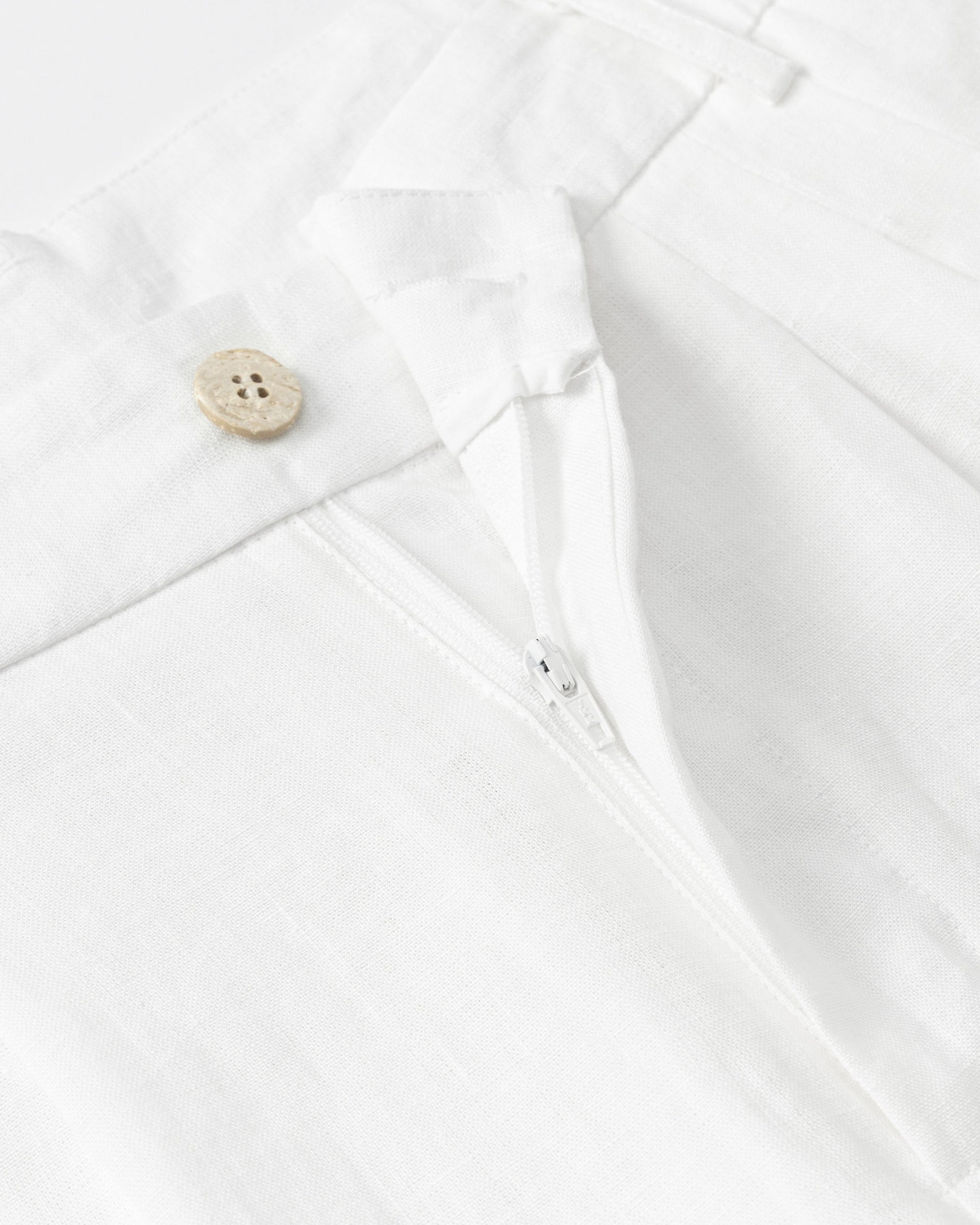 Juana Hemp High Rise Pants White (hemp) showing corozo button closure and front finish.