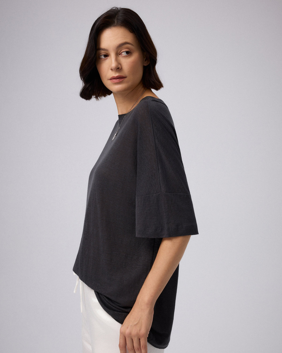 Juana Hemp Sheer Slub Tee black (hemp) model side view showing easy drape

