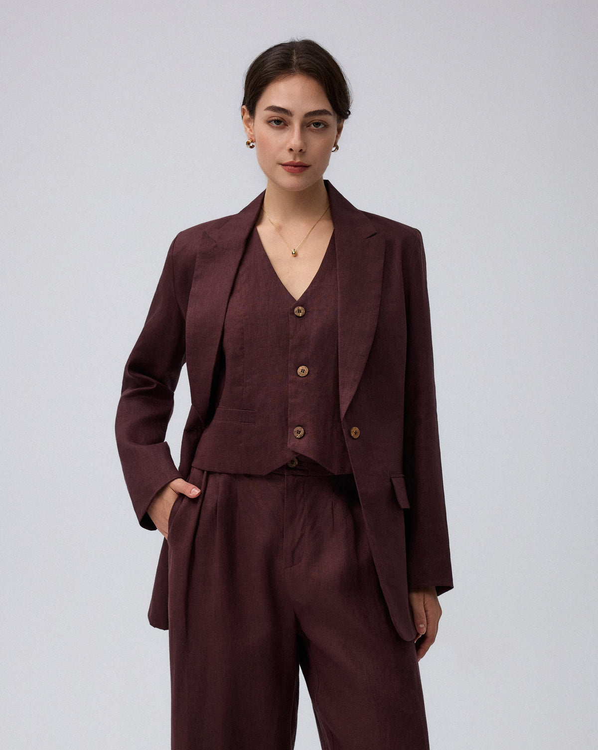 Juana Hemp Tailored Blazer in espresso (hemp) modeled from the front with a relaxed tailored fit and coconut buttons