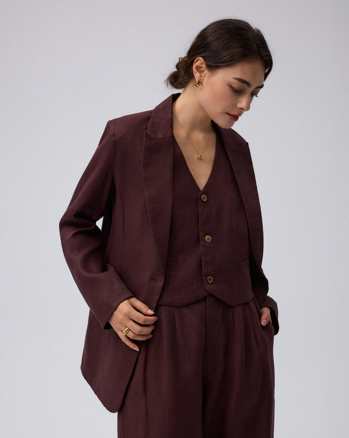 Juana Hemp Tailored Blazer in espresso (hemp) side view showing the relaxed profile and front pocket depth
