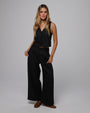 Woman wearing Juana Hemp Tailored Vest and High Rise Pants in 100% hemp (natural), styled for sustainable everyday wear.