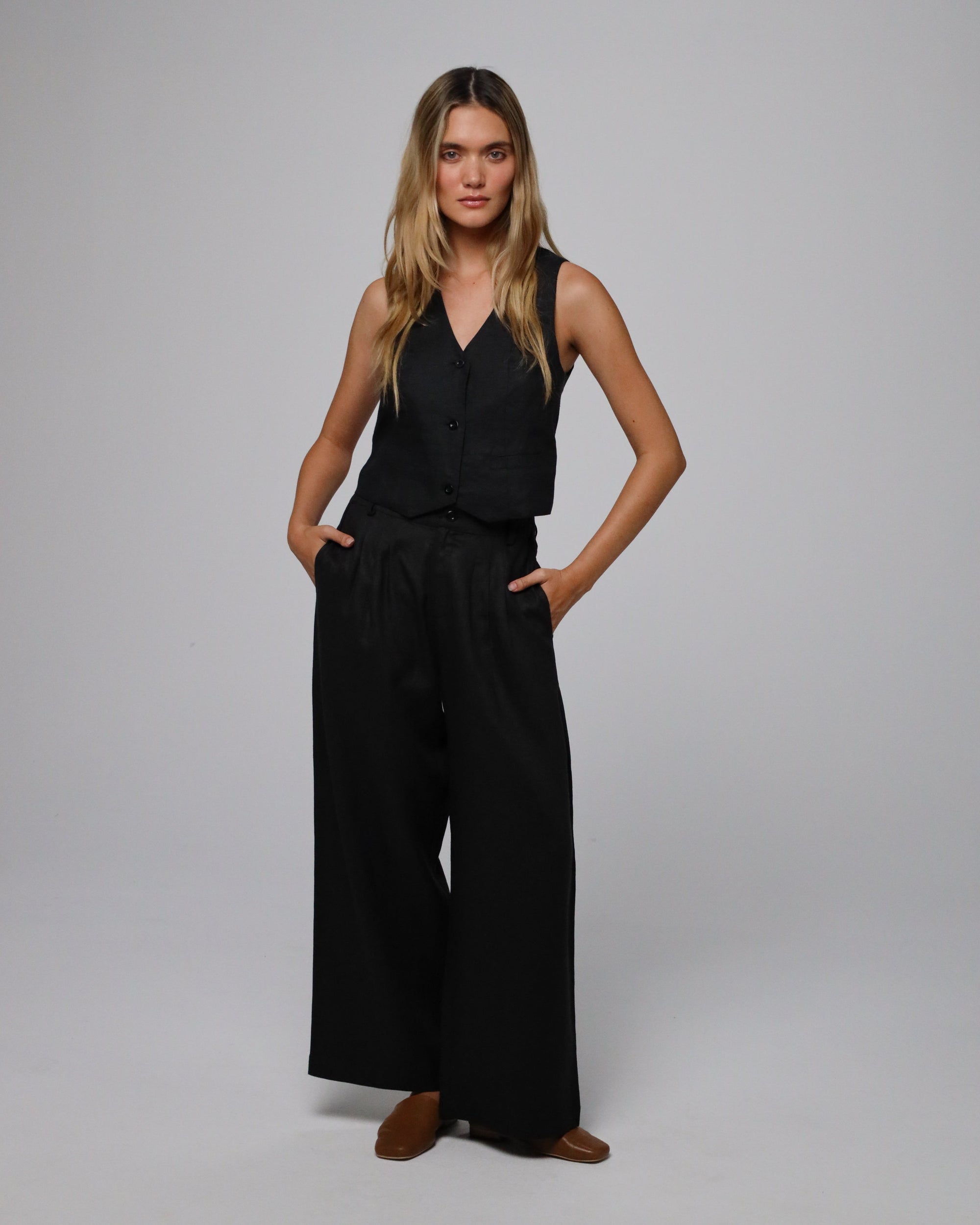 Full-body view of Juana Hemp Tailored Vest (natural) paired with Juana Hemp High Rise Pants for a matching set.