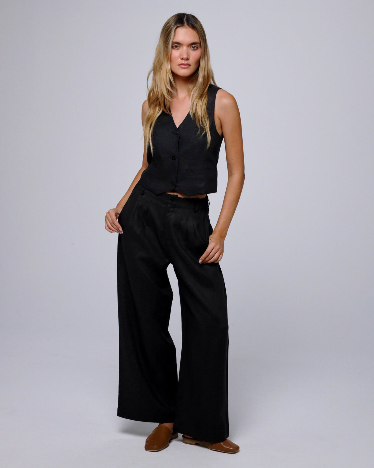 Full-body view of Juana Hemp Tailored Vest (natural) paired with Juana Hemp High Rise Pants for a matching set.