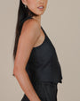 Woman wearing Juana Hemp Vest made from 100% hemp, styled as part of a sustainable outfit.