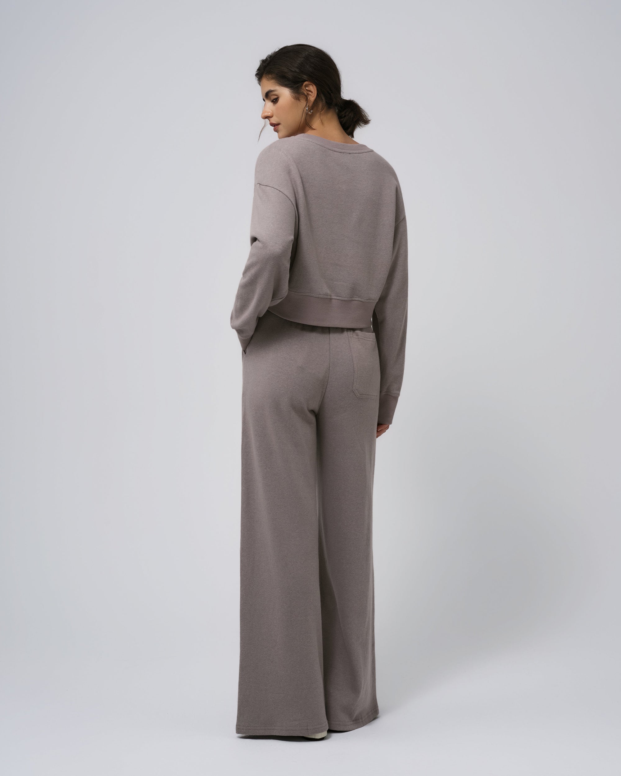 Back view of gray fleece set; clean top panel and jogger taper.