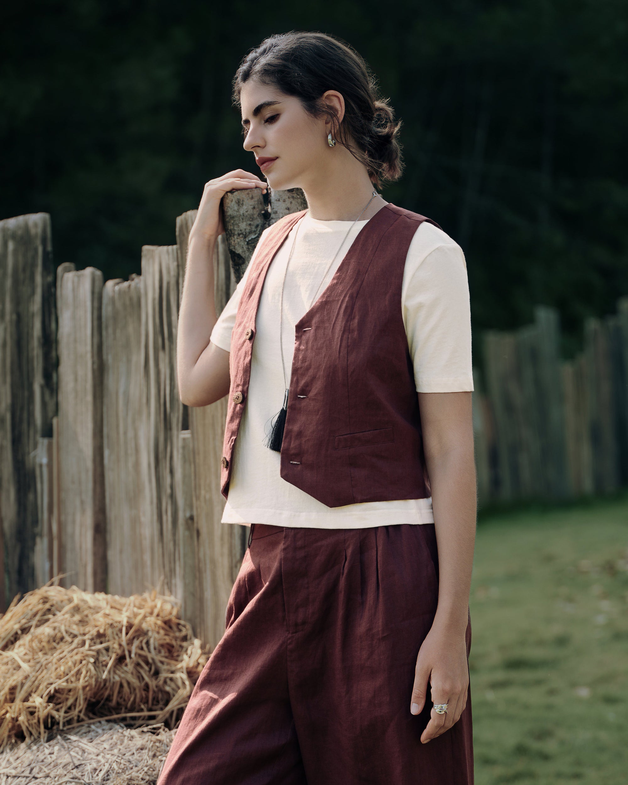 Layered styling: Juana Hemp Essentials Short Sleeve Tee (white) with Hemp Tailored Vest (expresso), paired with trousers for minimalist polish.