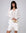 Juana Sumire Open Knit Striped Cardigan white (cotton–cellulose–rayon blend) styled with matching tank in complete look