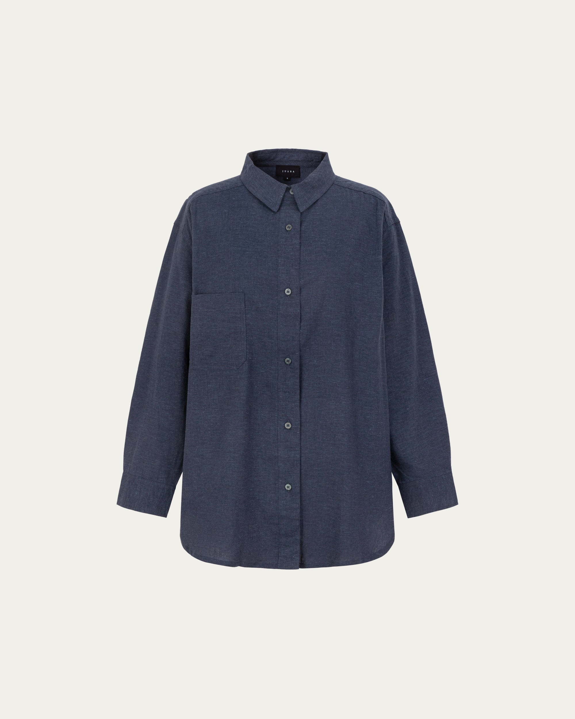 Lyricist Oversized Shirt in indigo blue on ghost mannequin, front view highlighting oversized cut and button placket.