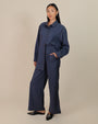 Full-body view of Juana Lyricist Oversized Shirt with matching high-rise pull-on pants for a coordinated, sustainable set.