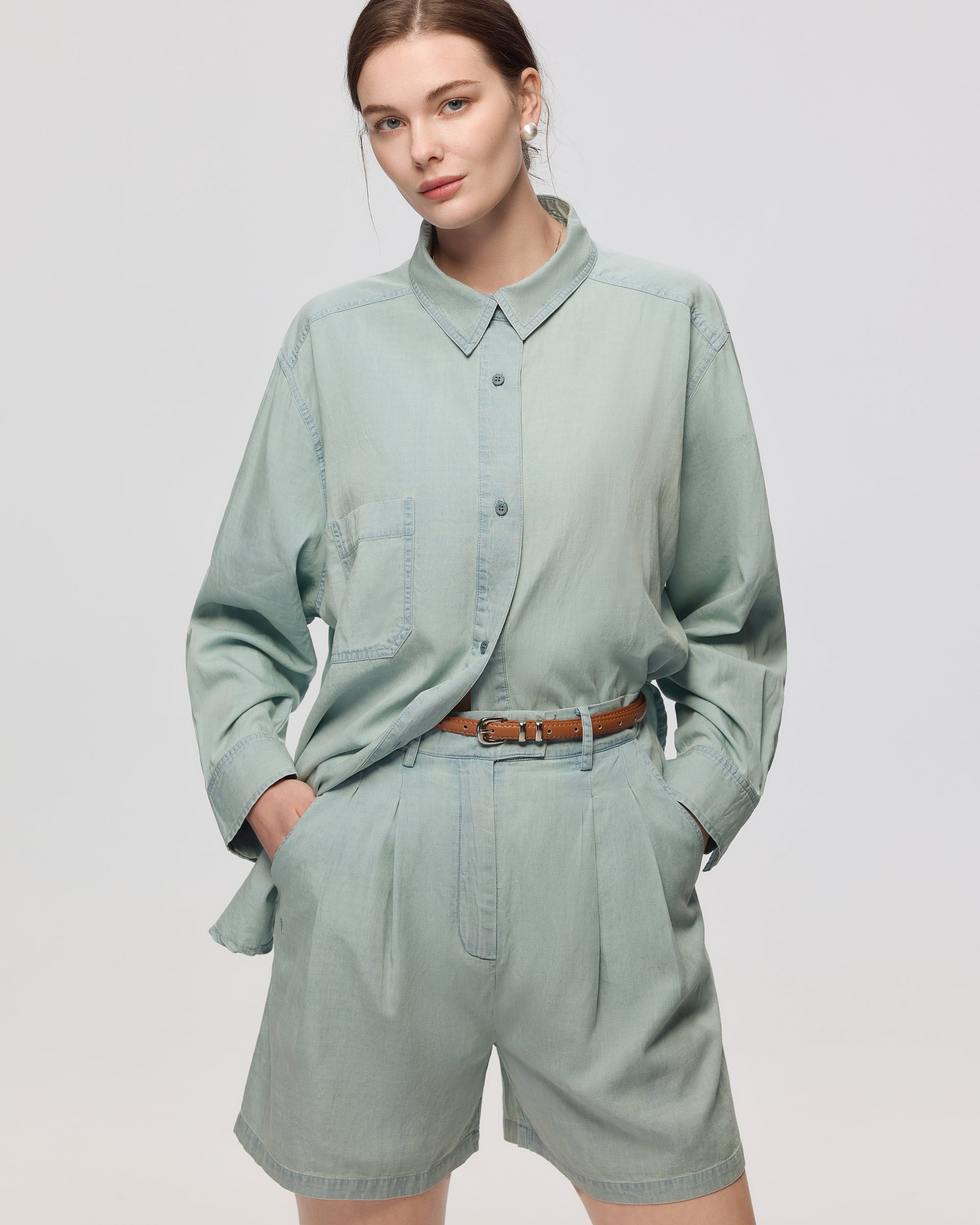 Juana Lyricist Pleated Shorts chambray blue (Sustainable Tencel–Cotton–Hemp) styled for warm-weather outfitting with refined drape