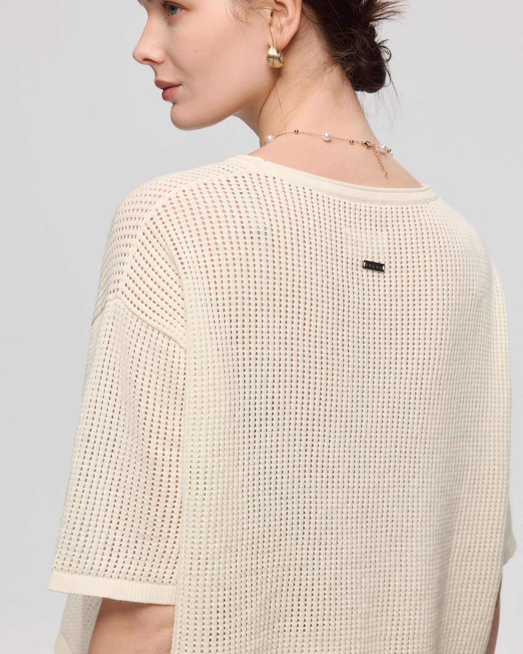 Juana Marina Crochet Tee Cream (sustainable cotton–hemp) back view on model showing boxy silhouette and airy knit