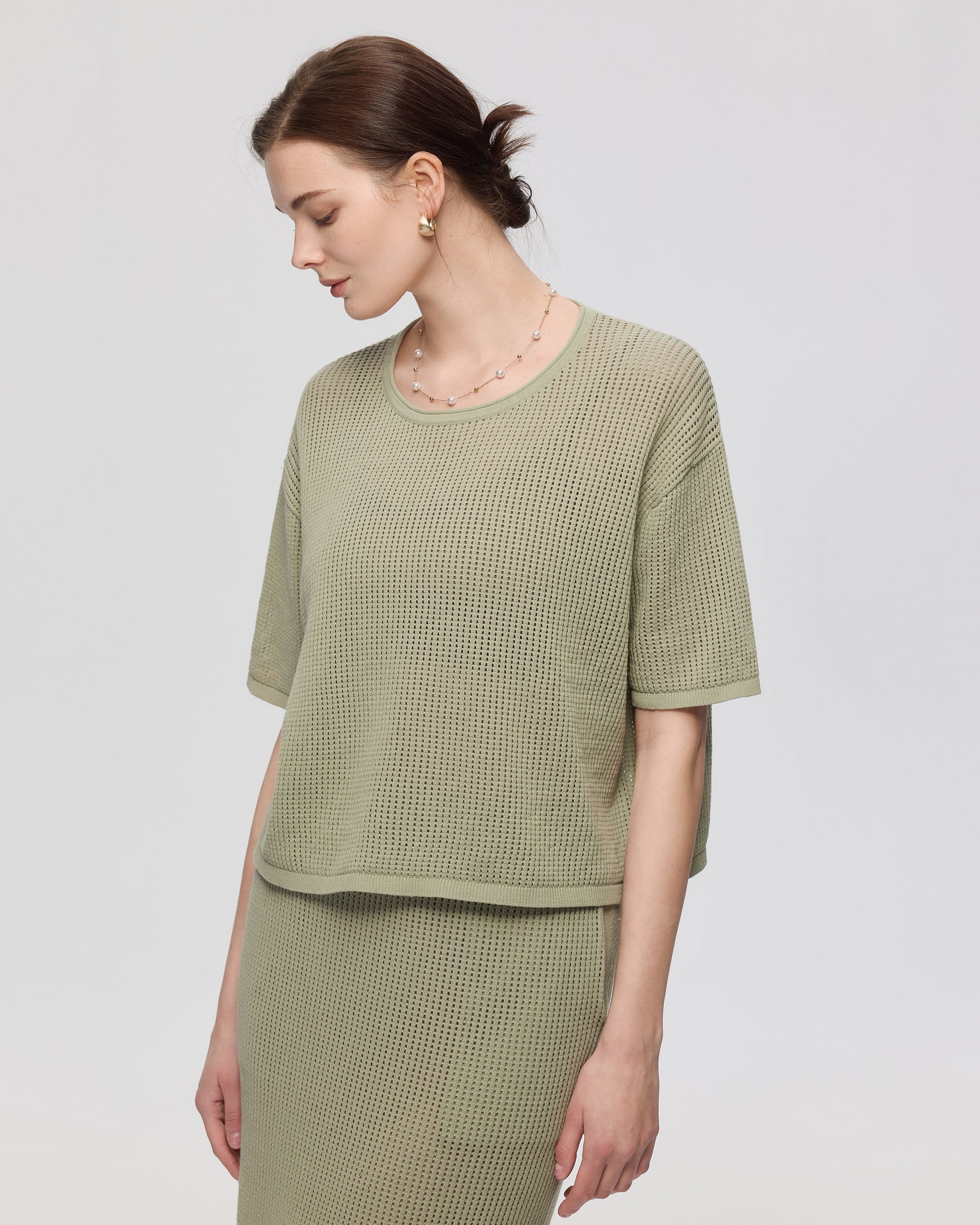 Juana Marina Crochet Tee Sage (sustainable cotton–hemp) on model showing oversized crewneck and boxy fit