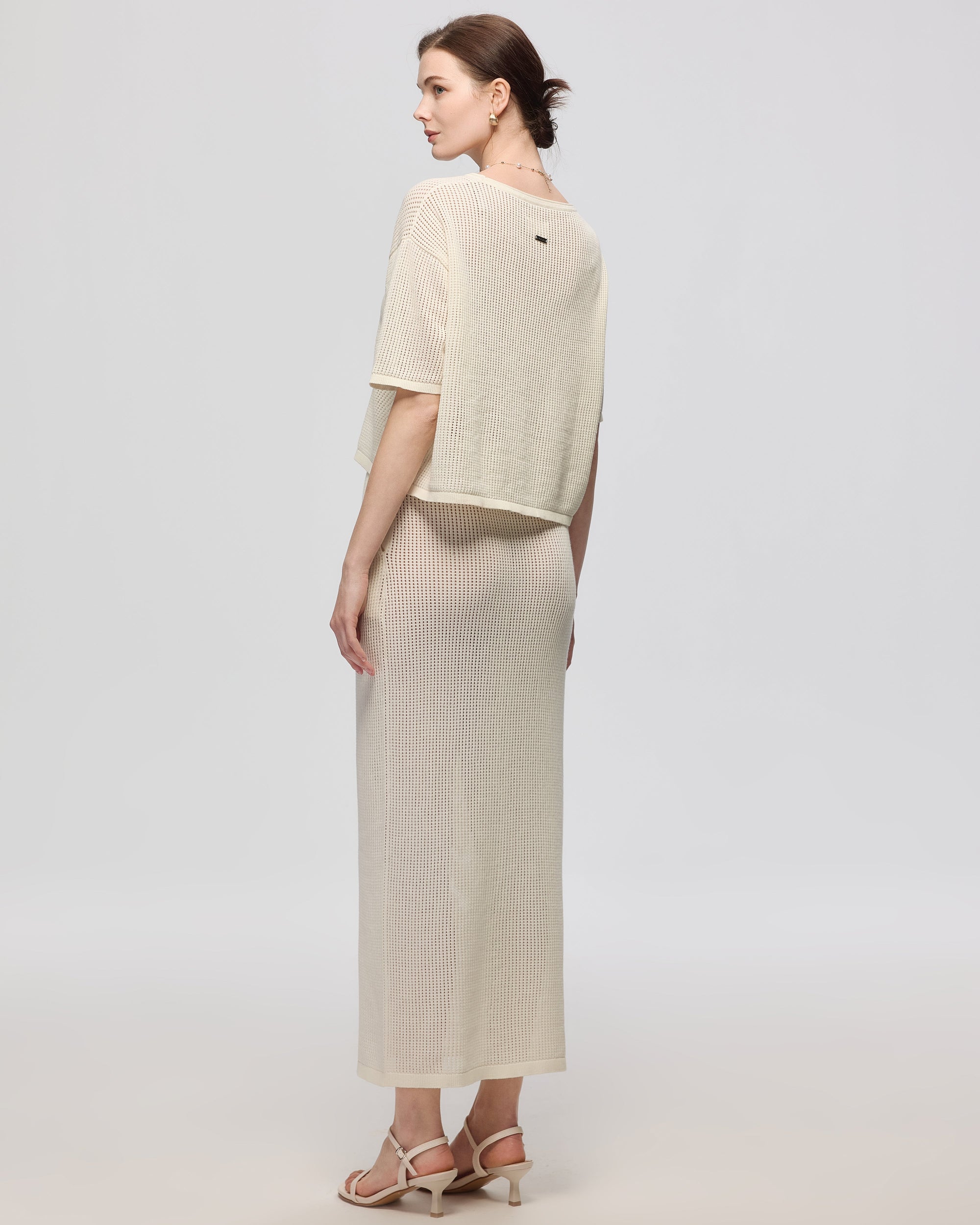 Juana Marina Open Knit Skirt Cream (sustainable cotton–hemp) back view showing elastic waistband and clean maxi line
