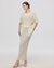 Juana Marina Open Knit Skirt Cream (sustainable cotton–hemp) on model showing relaxed maxi drape and open knit texture