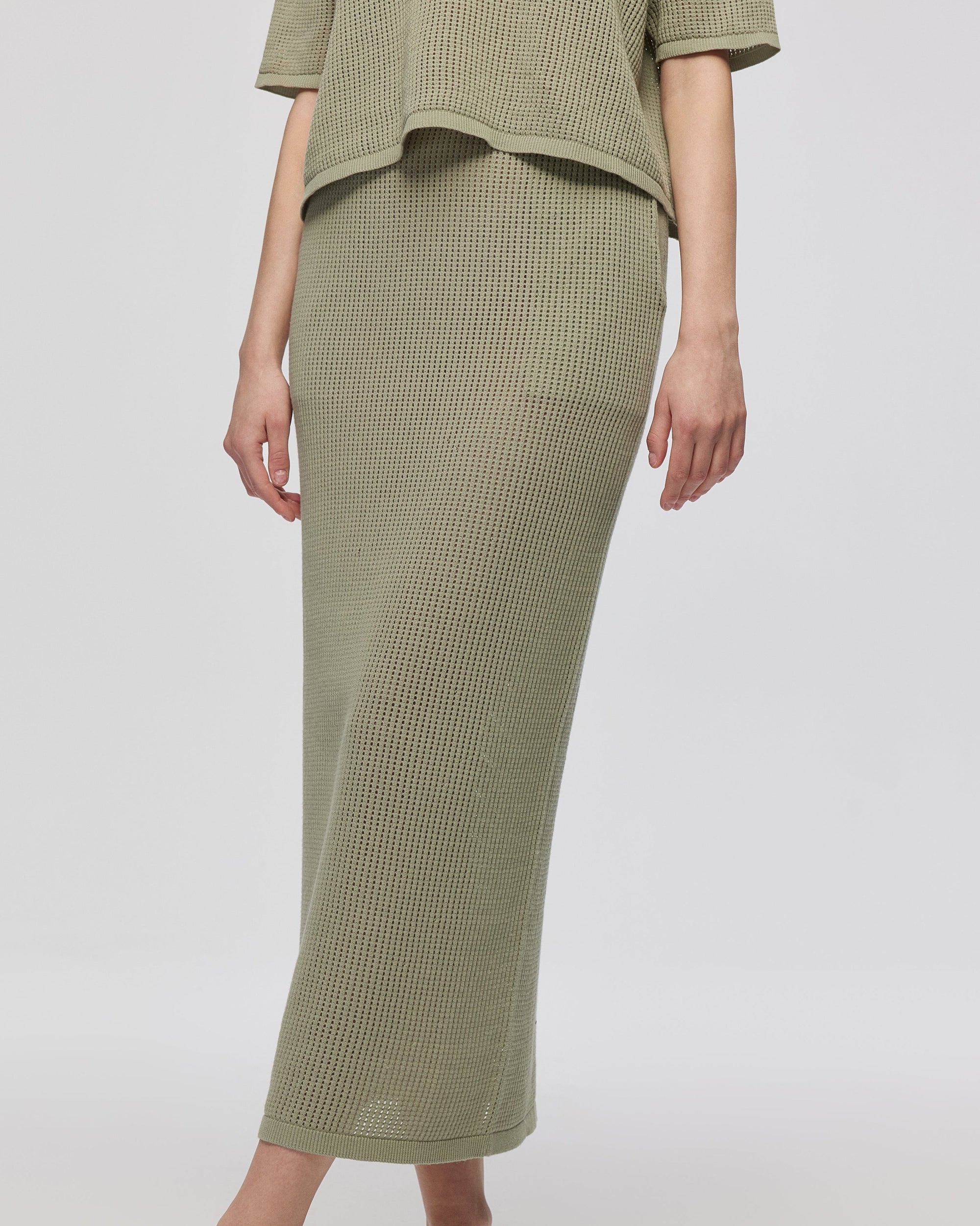Juana Marina Open Knit Skirt Sage (sustainable cotton–hemp) detail on model showing waistband stretch and stitch texture