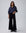 Juana Mid-Rise Cropped Pants in Black (merino wool–hemp–silk) styled with a fitted knit to highlight the pull-on waist.