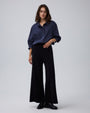 Juana Mid-Rise Cropped Pants in Black (merino wool–hemp–silk) styled with a fitted knit to highlight the pull-on waist.