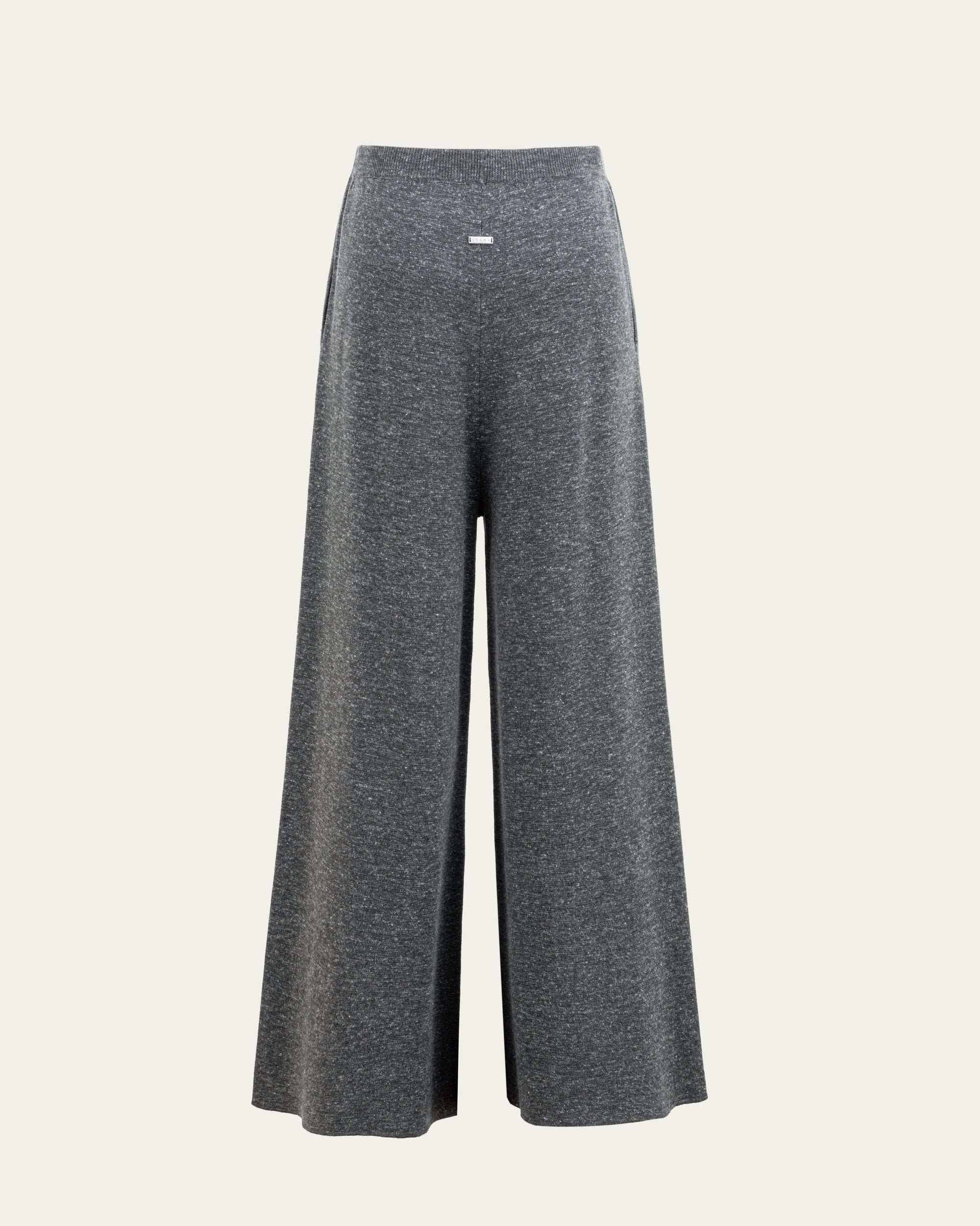 Juana Mid-Rise Cropped Pants in Charcoal (merino wool–hemp–silk) shown from the back with a clean waistband and cropped hem.