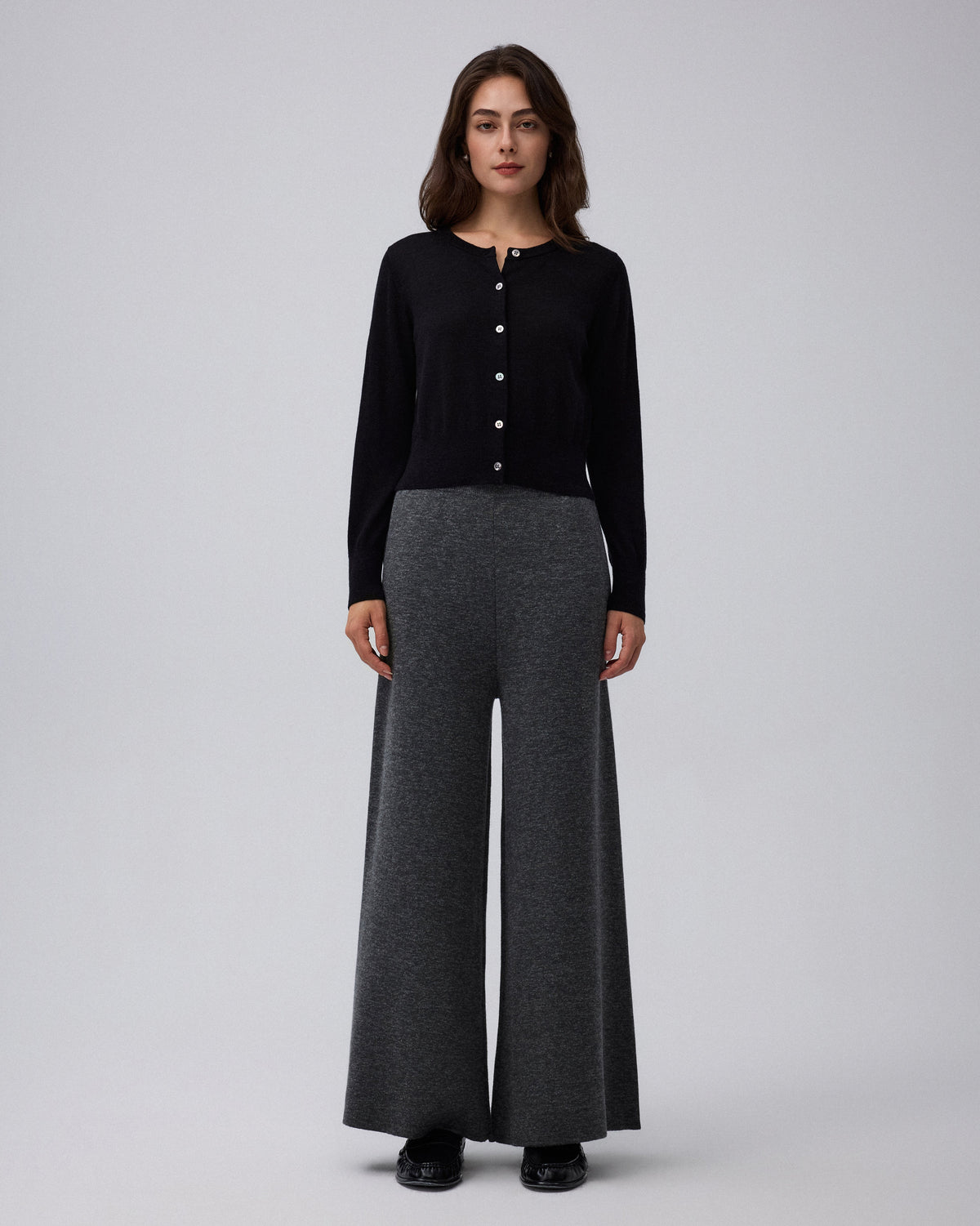Juana Mid-Rise Cropped Pants in Charcoal (merino wool–hemp–silk) styled with a fitted knit to highlight the pull-on waist.