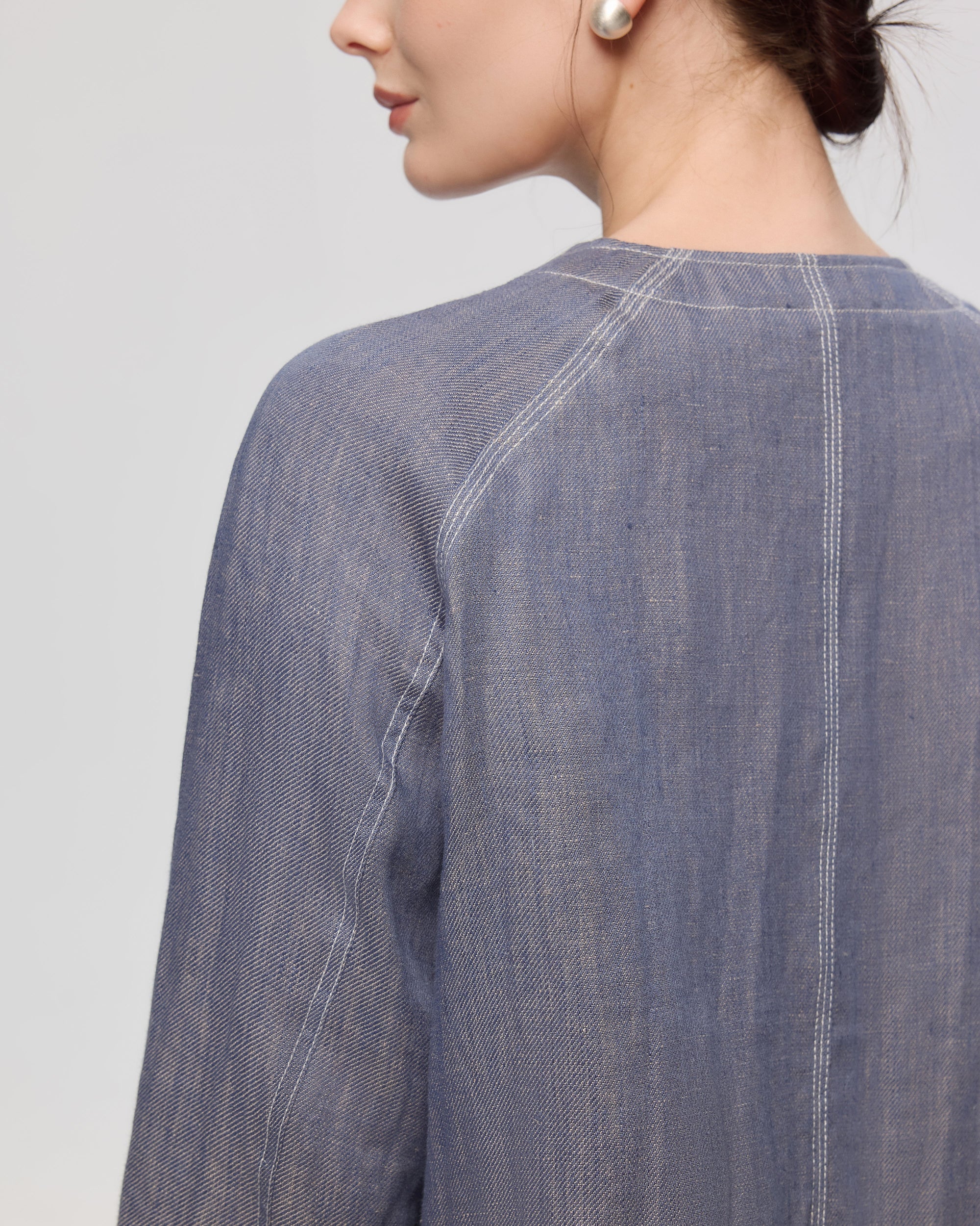 Juana Mira Boxy Jacket Steel blue (linen–hemp) on model back view showing boxy drape and clean finish