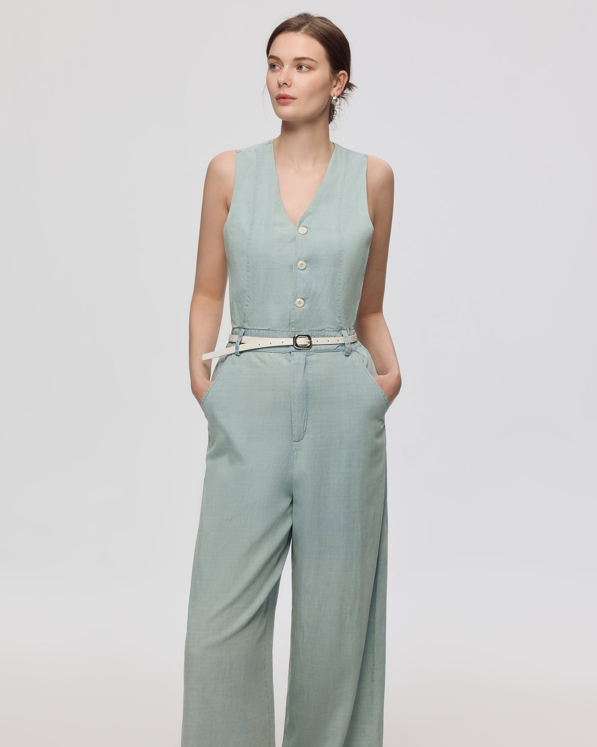 Juana Nahla Jumpsuit chambray blue (tencel–cotton–hemp) on model styled for elevated wear showing drape and structure