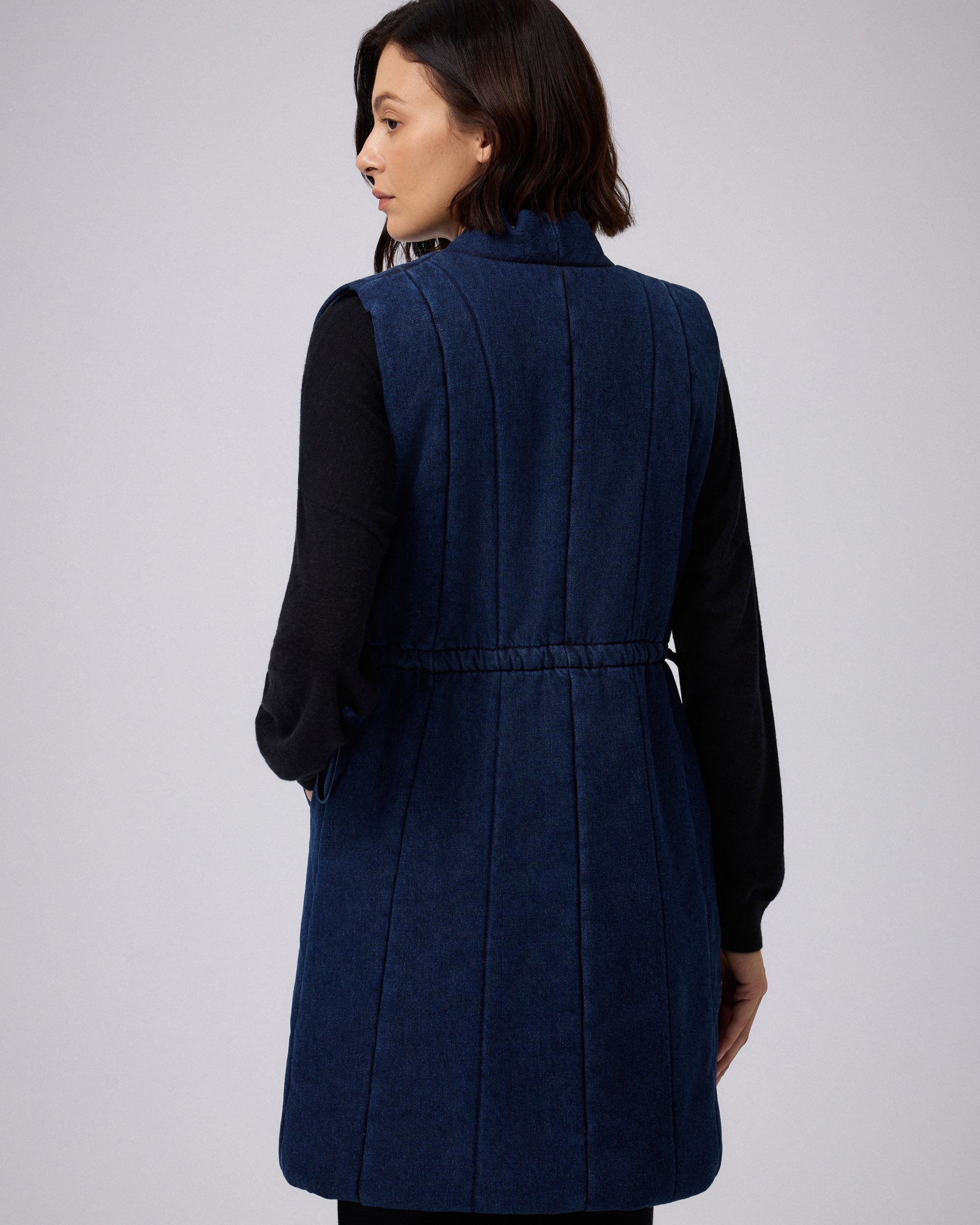 Juana Natural Fill Puffer Vest Dark Wash (organic cotton–hemp) back view showing the relaxed quilted silhouette