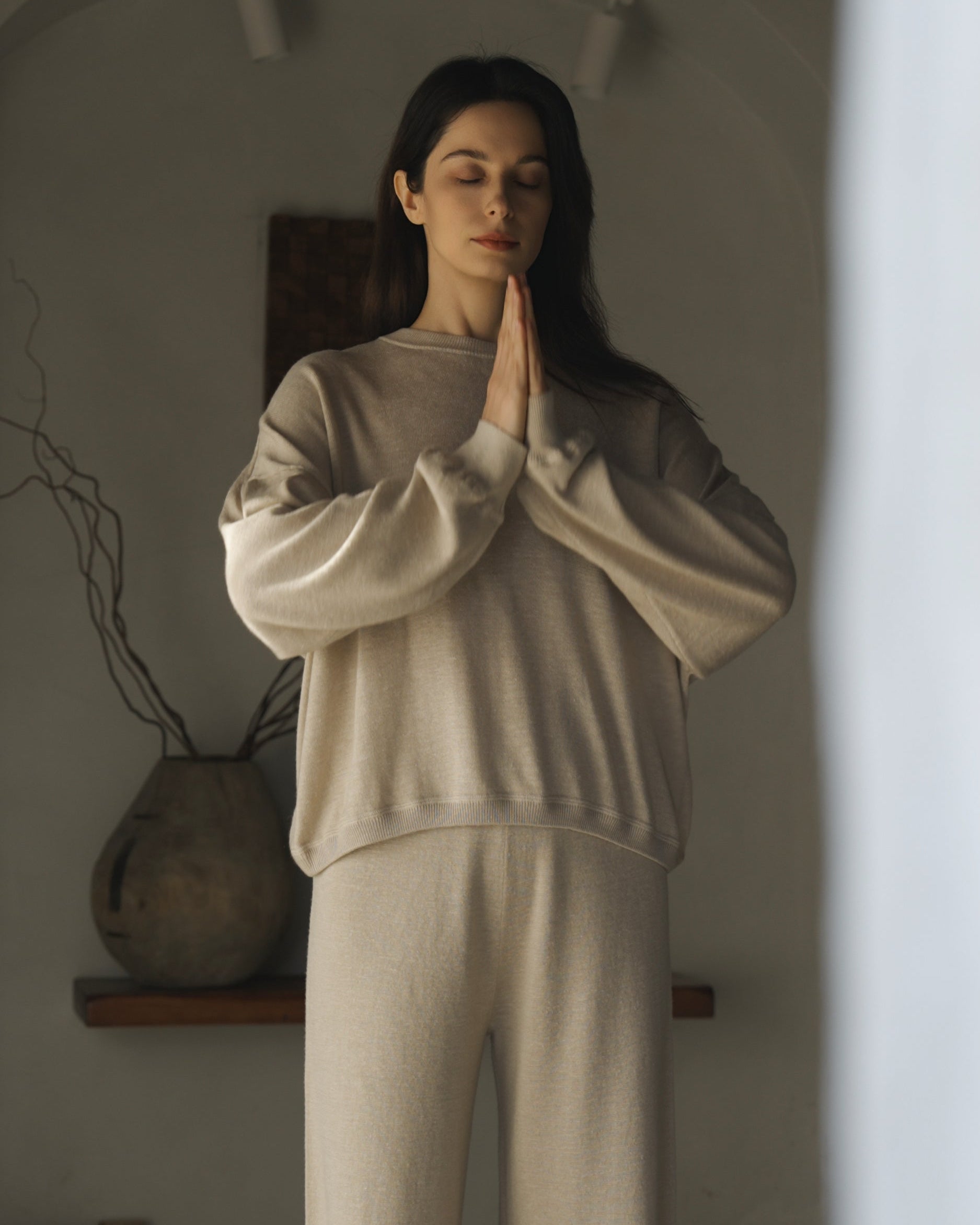 Full-body view of Nilo Knitted Hemp Crewneck (beige) paired with matching knit pants.