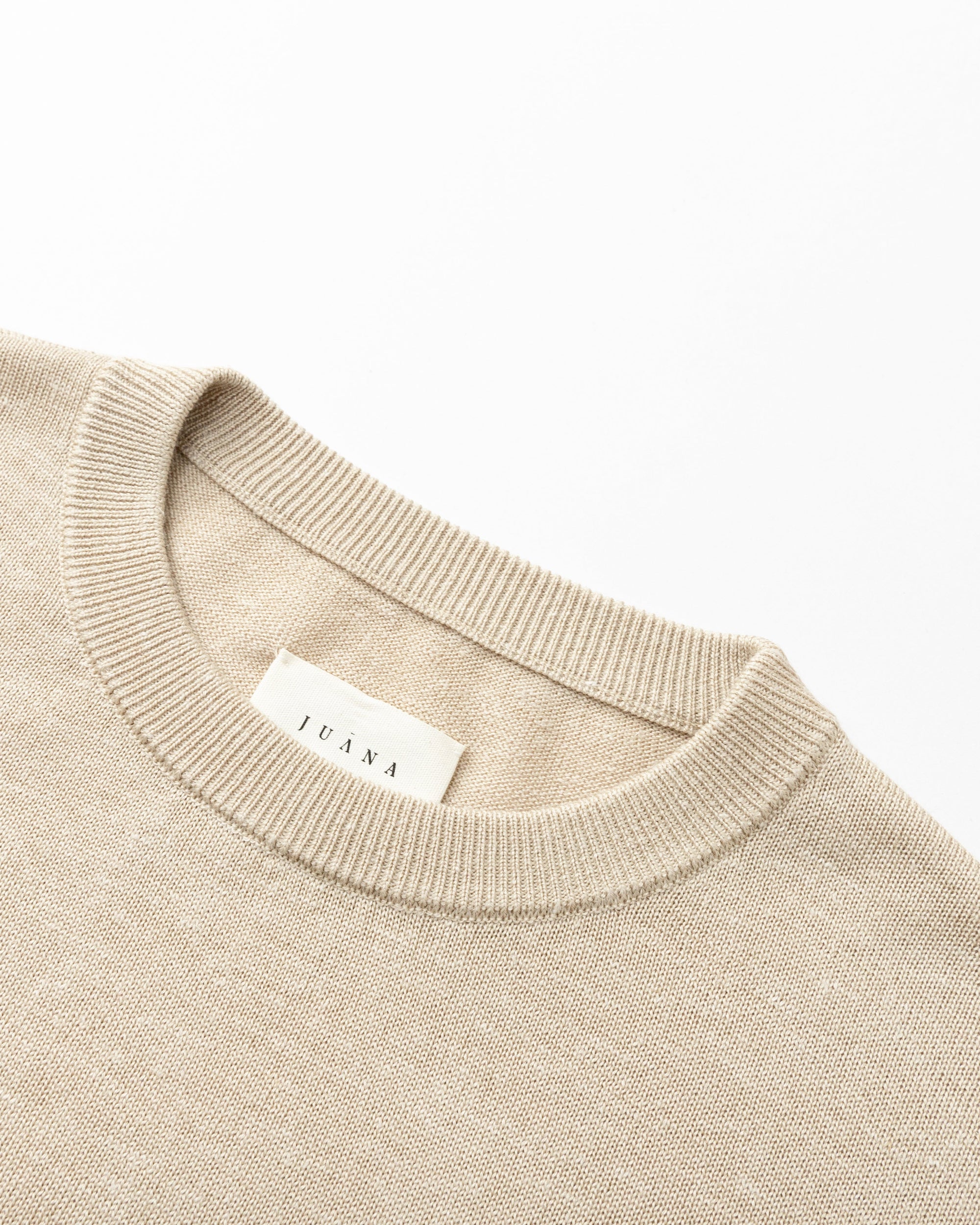 Detail shot of neckline and knit structure on Nilo Knitted Hemp Crewneck (beige).