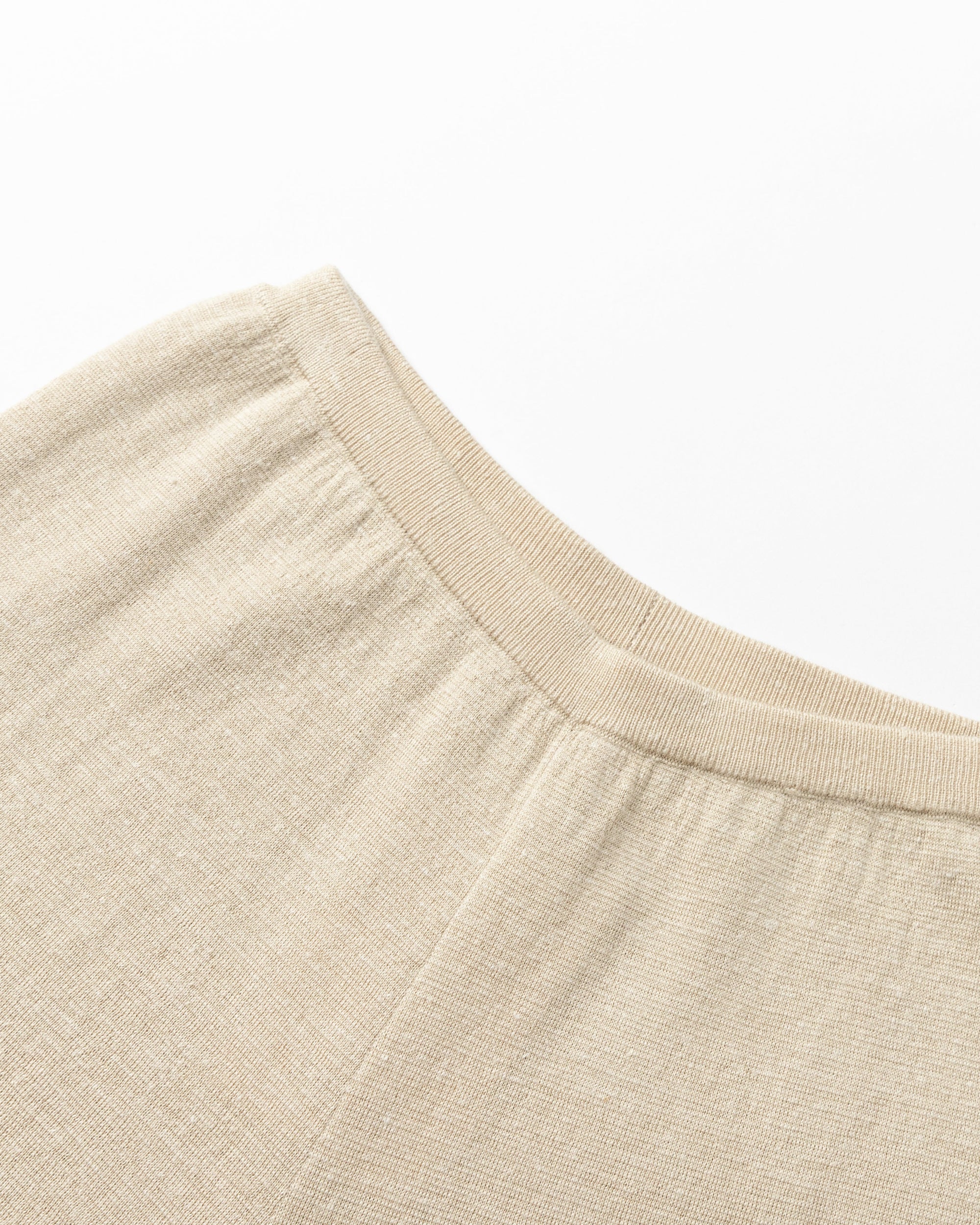 Detail shot of waistband and knit construction on Nilo Knitted Hemp Pull-on Pants (beige).