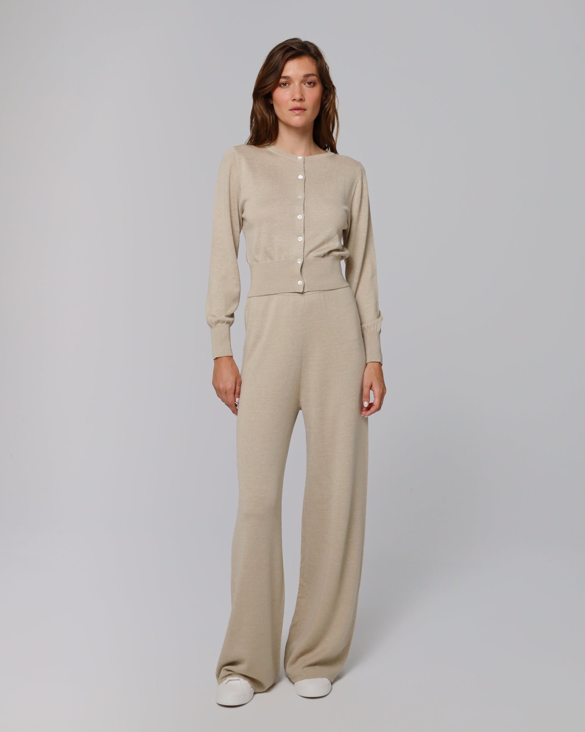 Full-body view of Nilo Knitted Hemp Pull-on Pants (beige) paired with Nilo Crewneck for a coordinated knit look.
