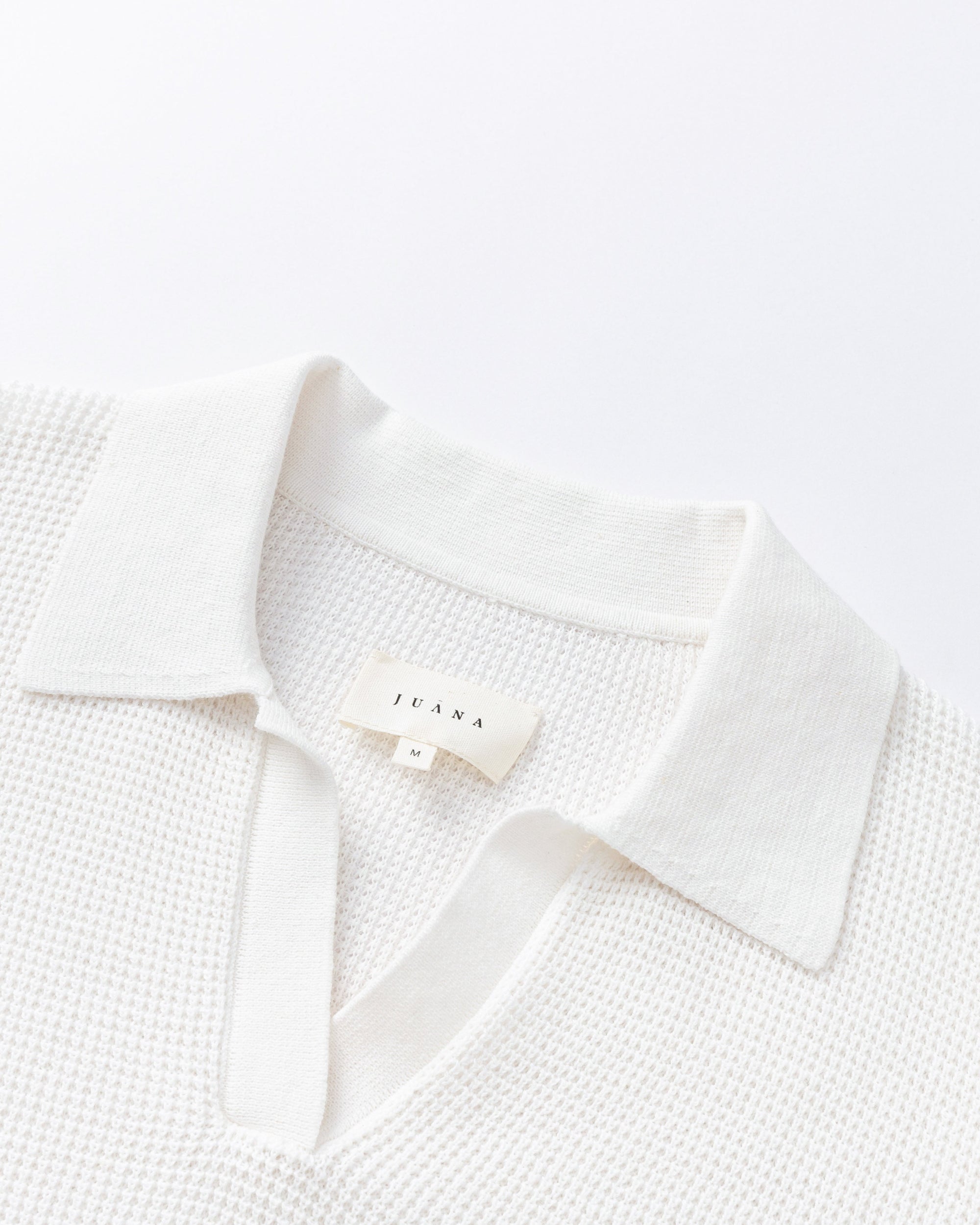 Juana Noa Open Knit Top cream (sustainable cotton–hemp) flat lay detail highlighting open knit and Johnny collar