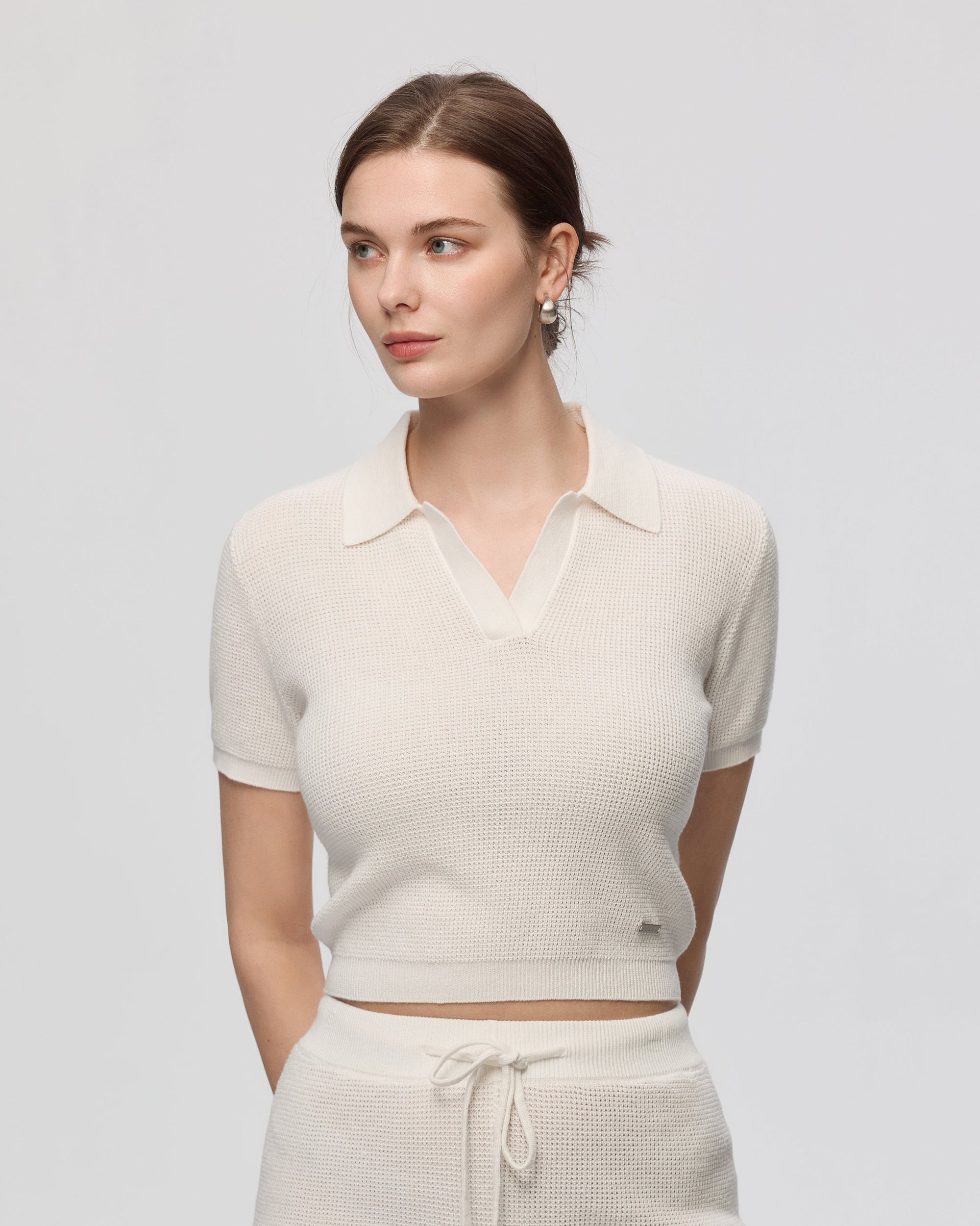 Juana Noa Open Knit Top cream (sustainable cotton–hemp) on model featuring Johnny collar and open-knit texture