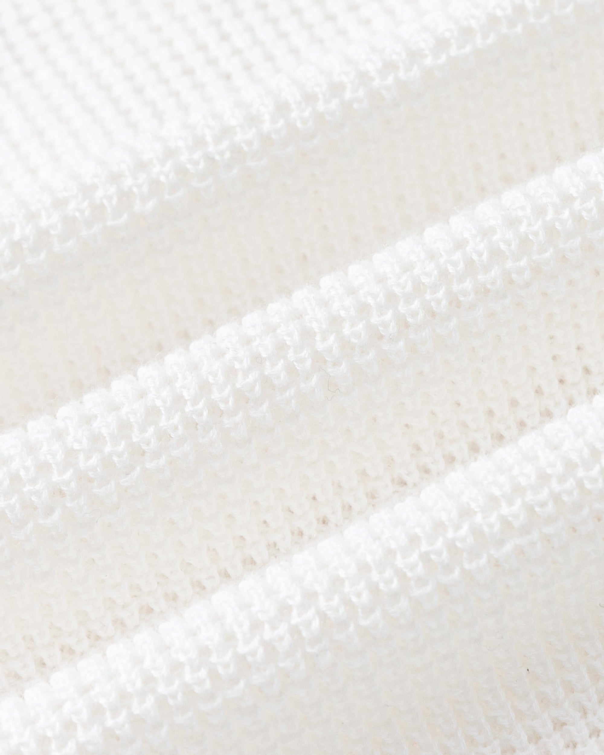 Juana Noa Open Knit Top cream (sustainable cotton–hemp) textile close-up showing breathable open-knit pattern