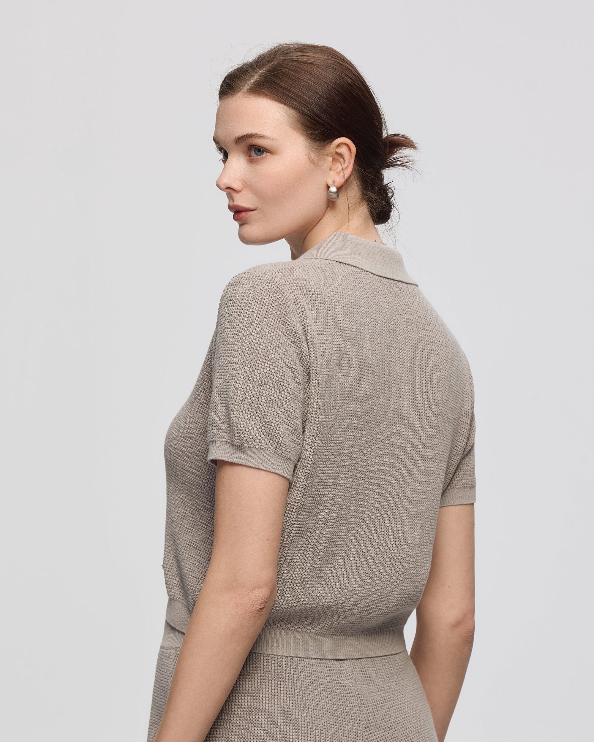 Juana Noa Open Knit Top light gray (sustainable cotton–hemp) back view on model showing relaxed drape
