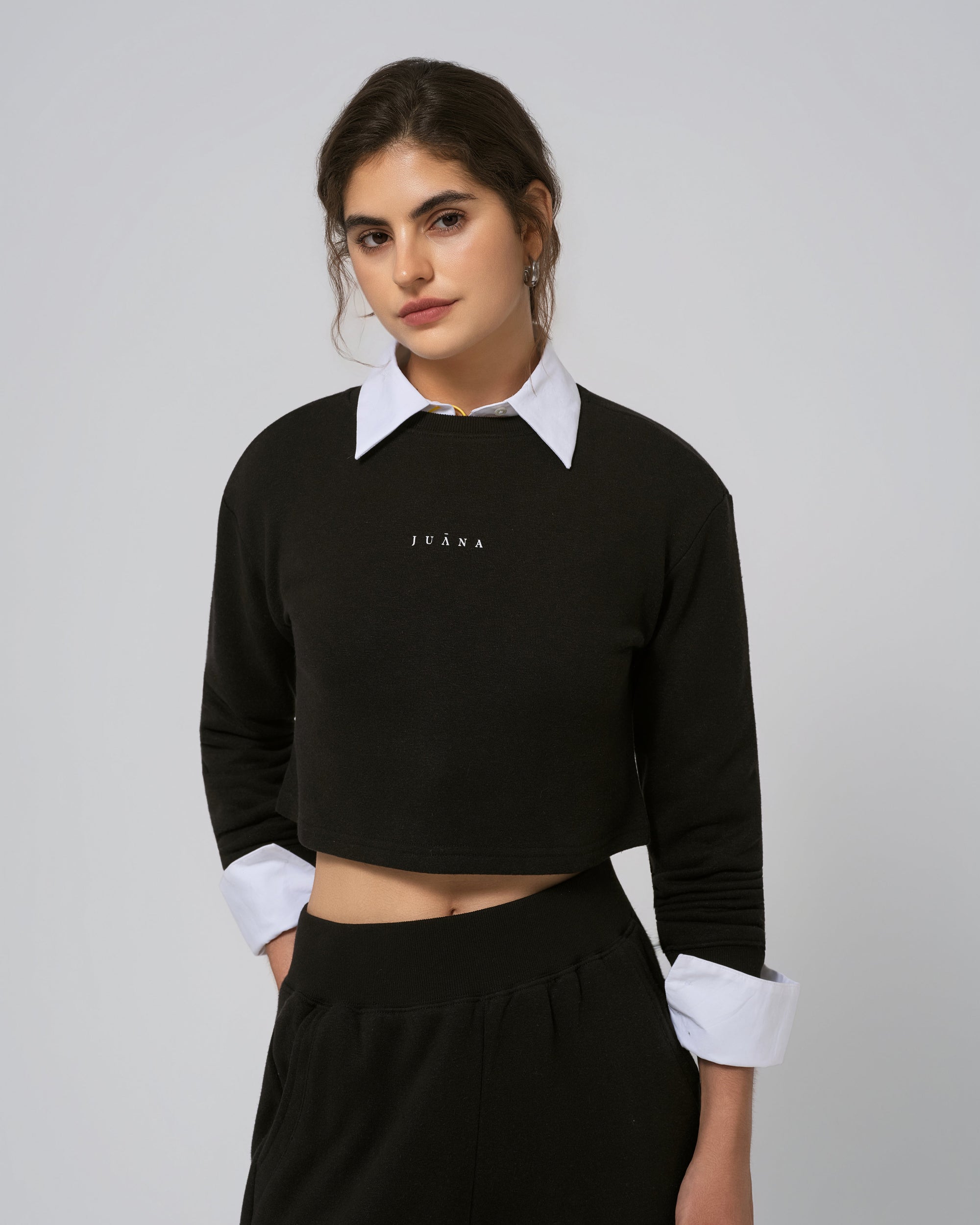 Close‑up of ribbed collar and cuff on Off Hours Crewneck Sweater in black (hemp–Tencel™).