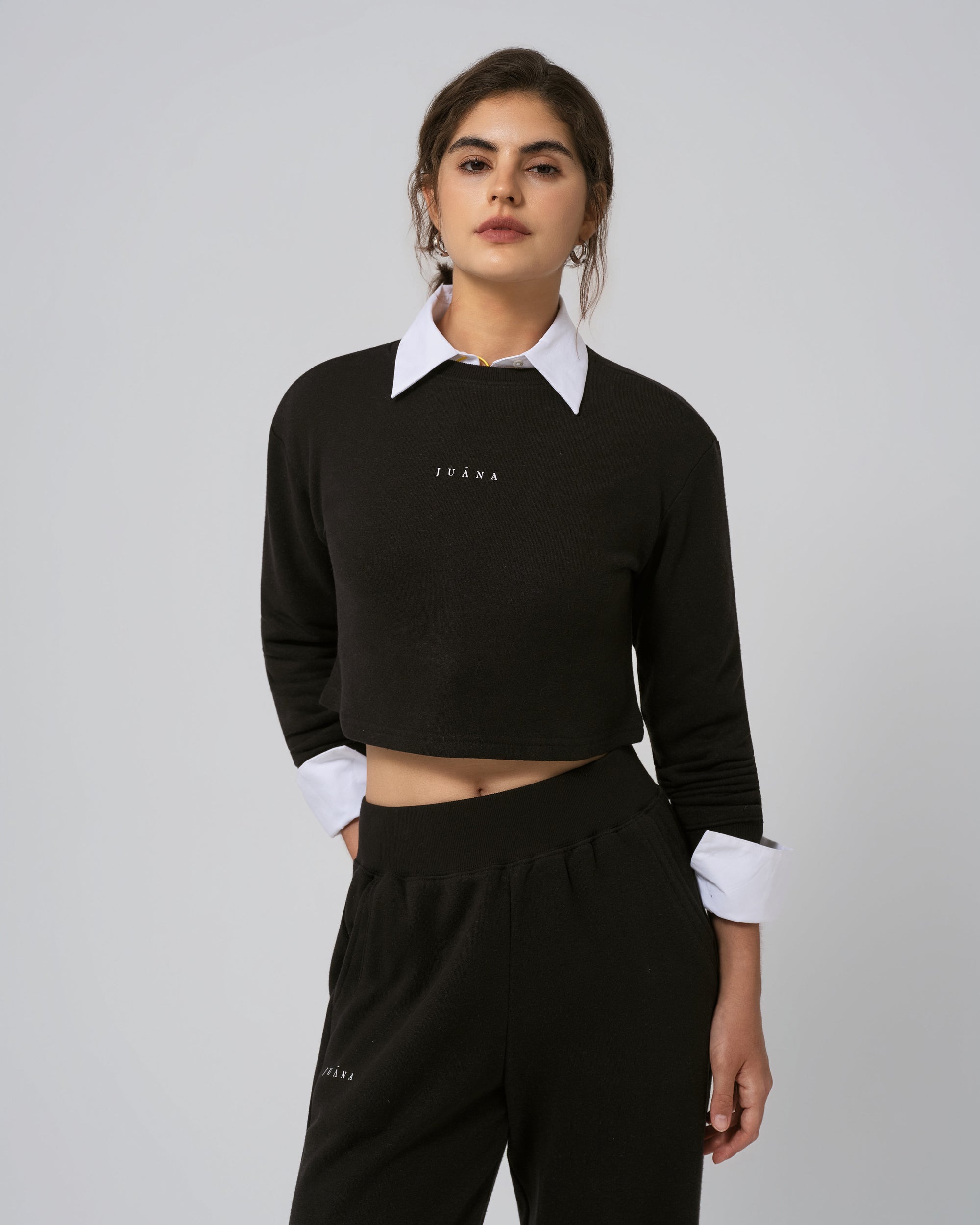 Styled with relaxed joggers; Off Hours Crewneck Sweater in black, casual everyday look.