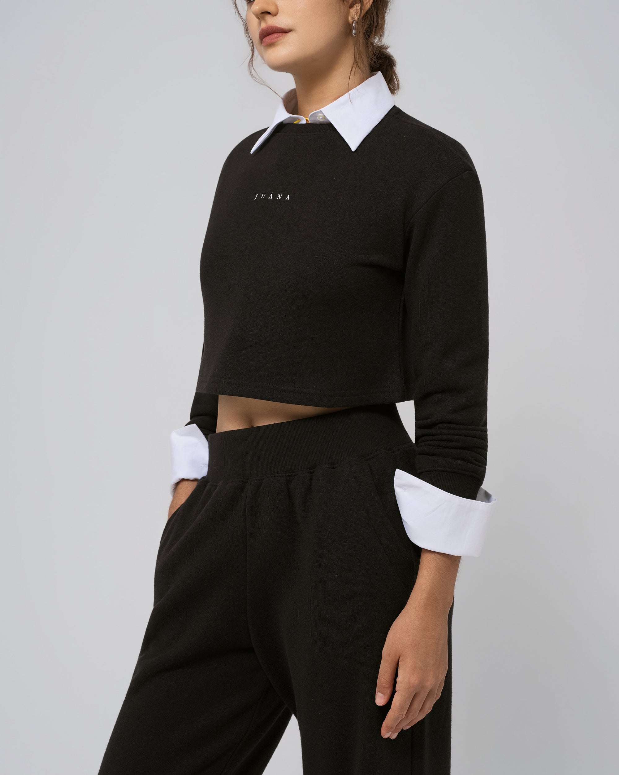 Side view of Off Hours Crewneck Sweater in black; relaxed shoulder profile and easy drape.