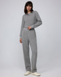 Woman wearing Juana Off Hours Mid Rise Joggers in a hemp–Tencel™ blend (gray), styled for sustainable everyday wear.