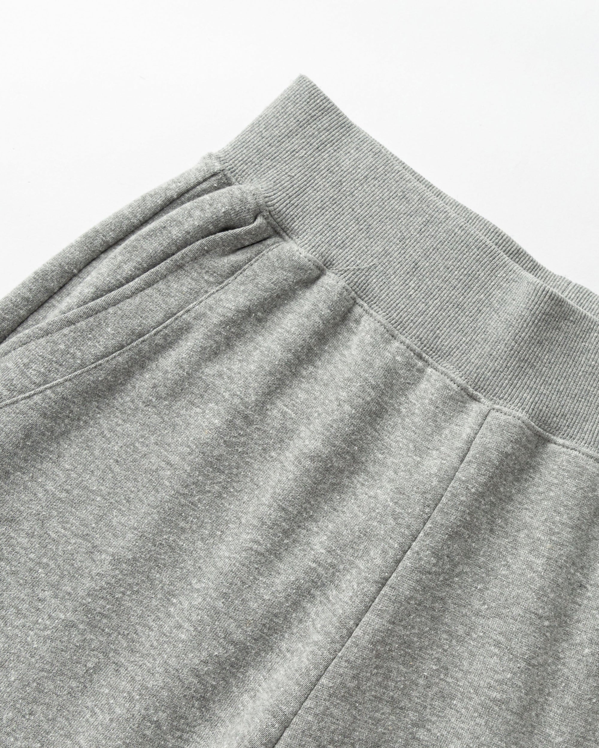 Detail shot of elastic waistband and stitching on Off Hours Mid Rise Joggers (grey).