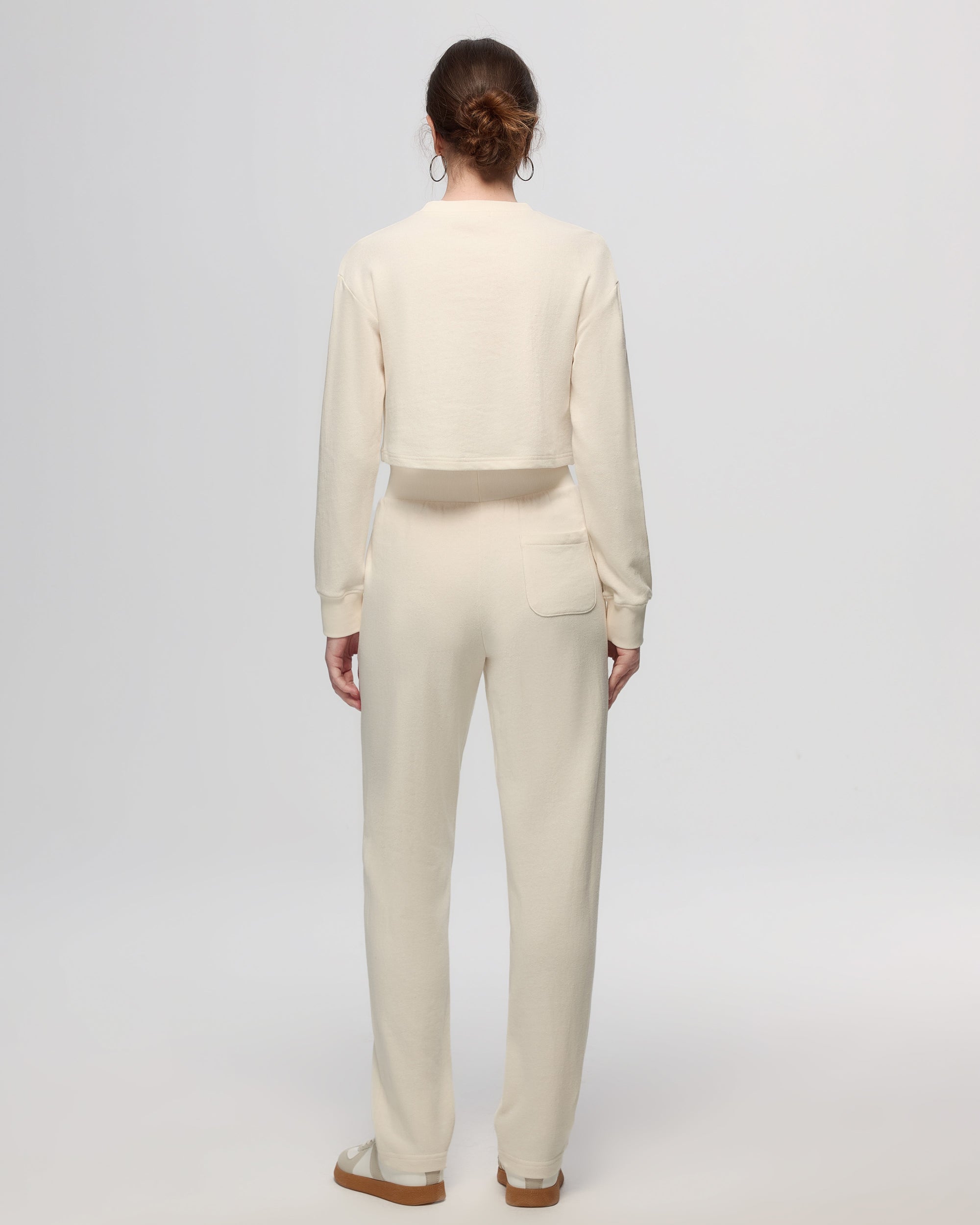 Juana Off Hours Natural Mid Rise Joggers cream (hemp–organic cotton) with tapered leg shown on model back