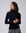 Detail shot of turtleneck collar, shoulder seam, and fine-gauge knit on Ossa Turtleneck (black).