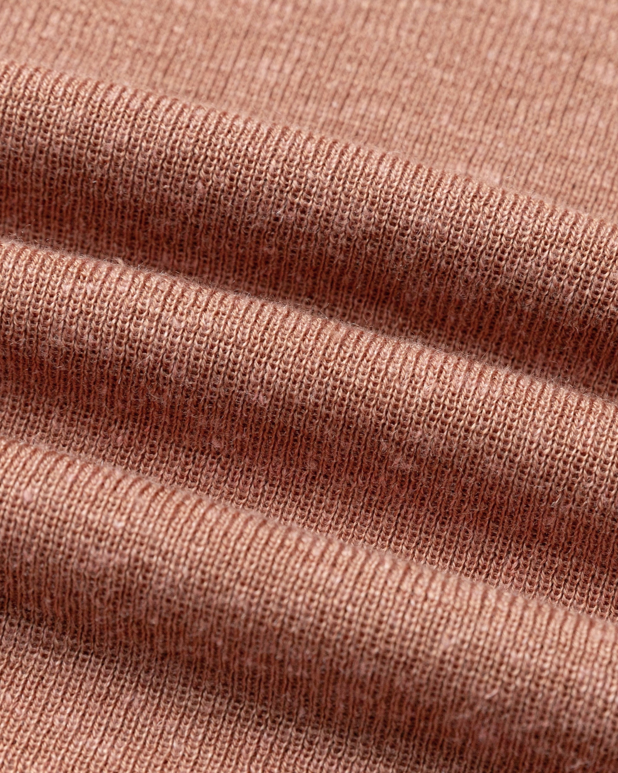 Close-up of merino–silk–hemp knit of the Ossa Turtleneck (Mocha Mousse), highlighting breathable, luxe texture.