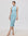 Juana Sera Rib Knit Skirt blue (sustainable hemp–cotton) on model showing body-skimming fit and rib knit texture