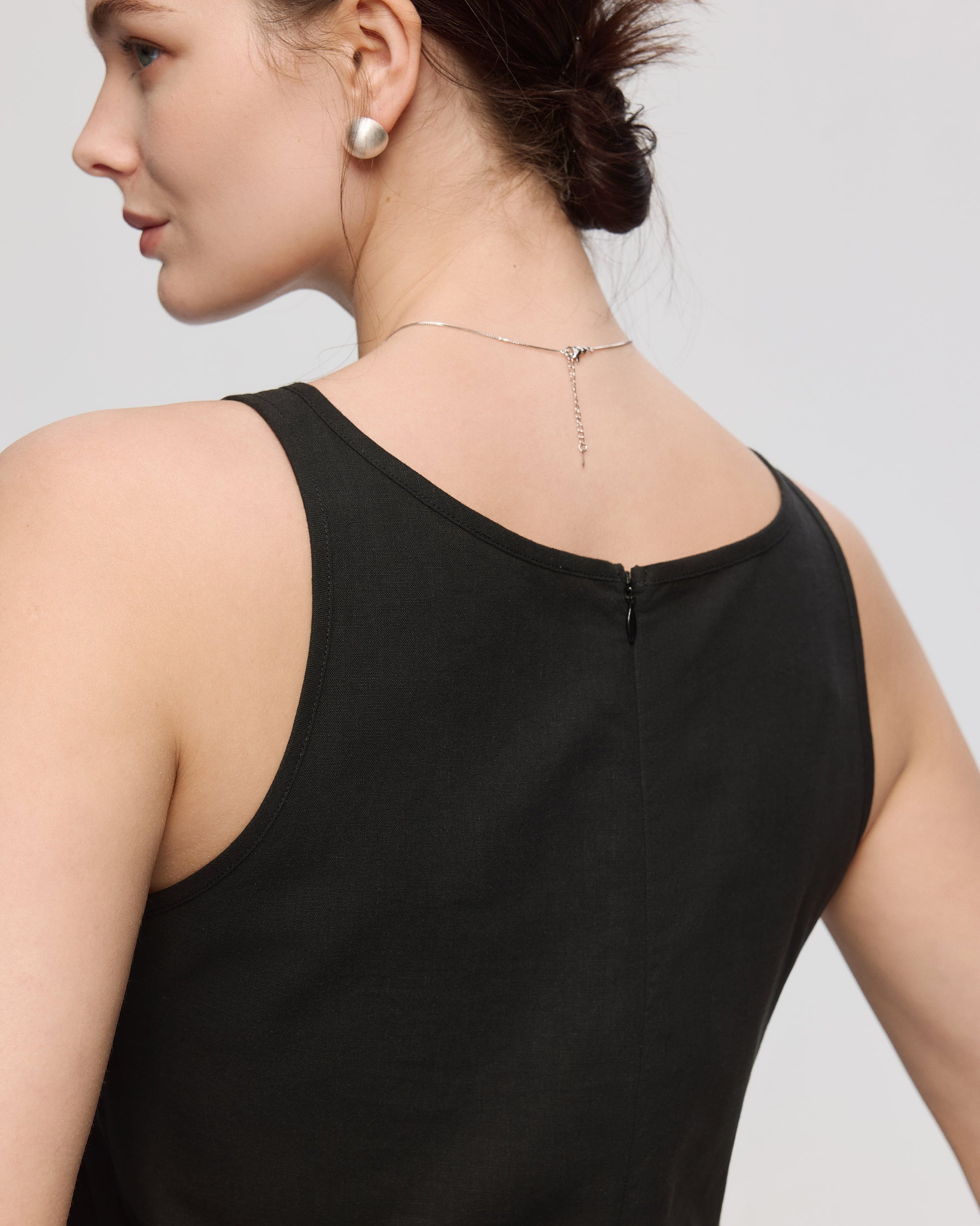 Juana Sienna Pleated Tank black (hemp–cotton) back view on model showing back zip opening